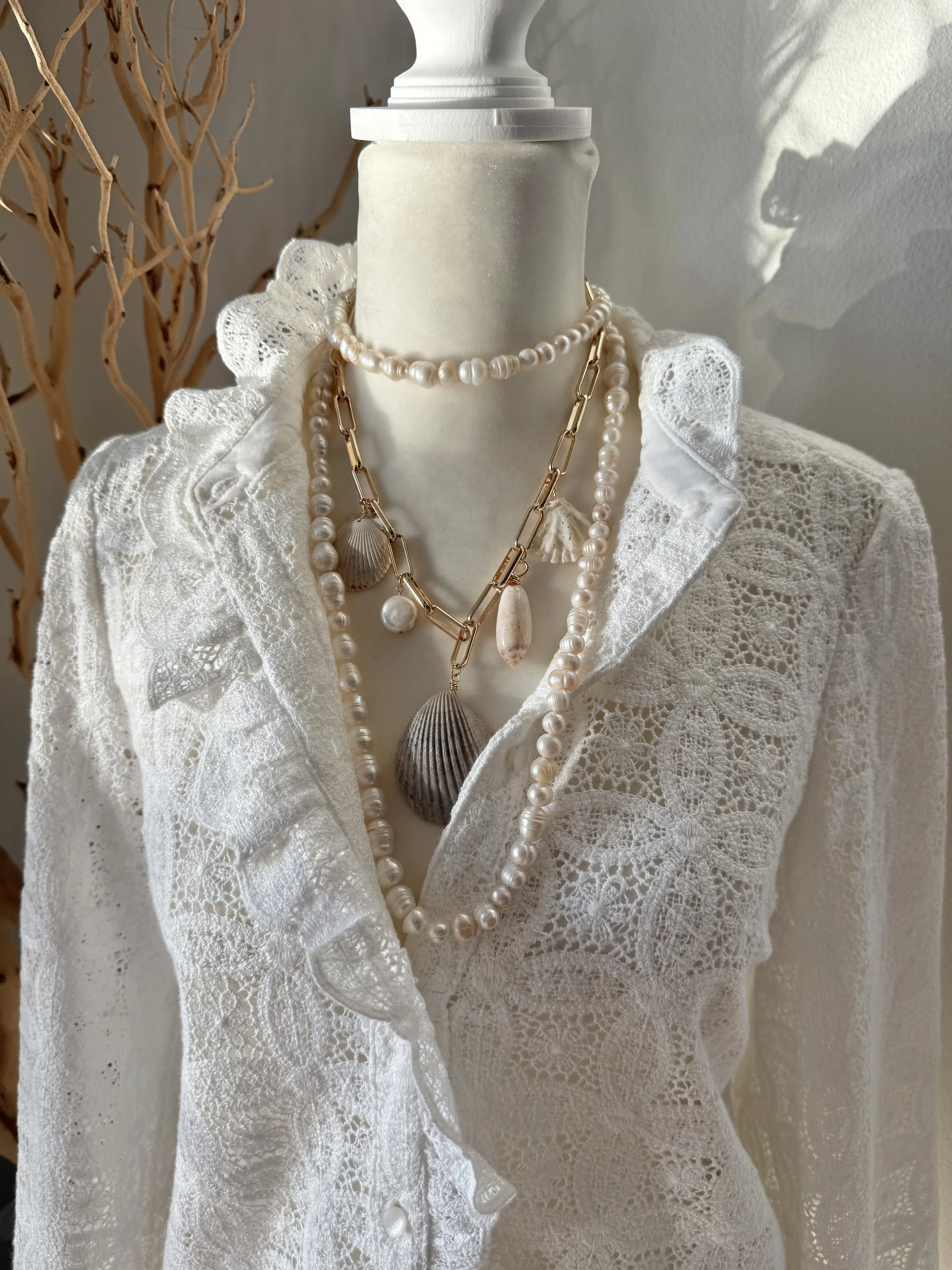 Special orders accepted on shell necklaces.