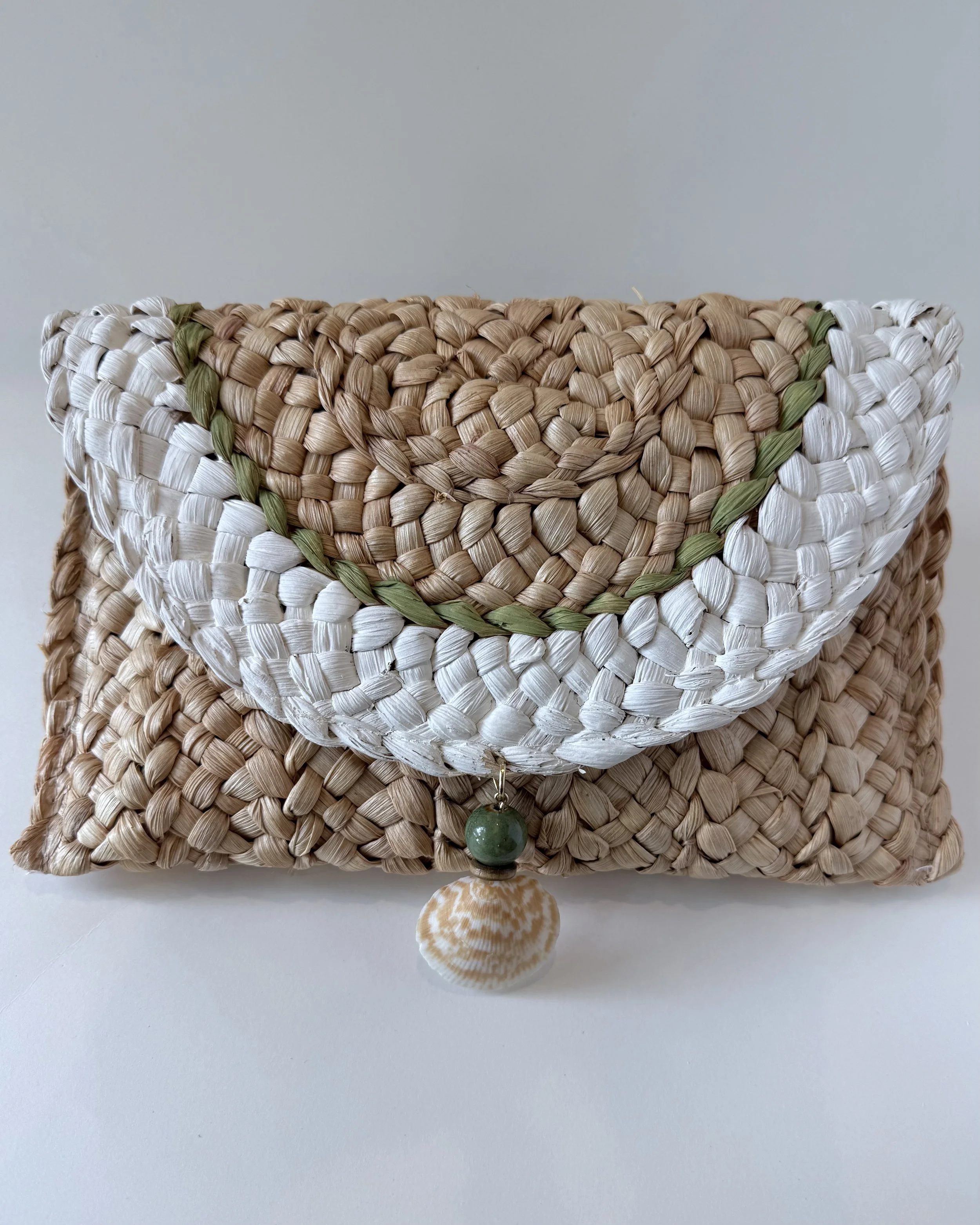 AVAILABLE:  Straw Clutch with Gulf Coast Bittersweet Clam Shell detail $68
Message if interested.