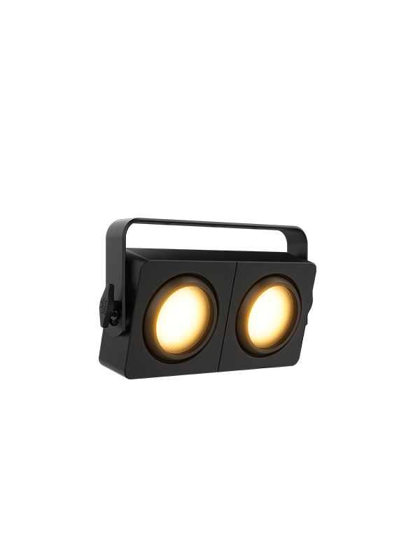 Portable black speaker with two yellow lighted speaker grilles and a carrying handle.