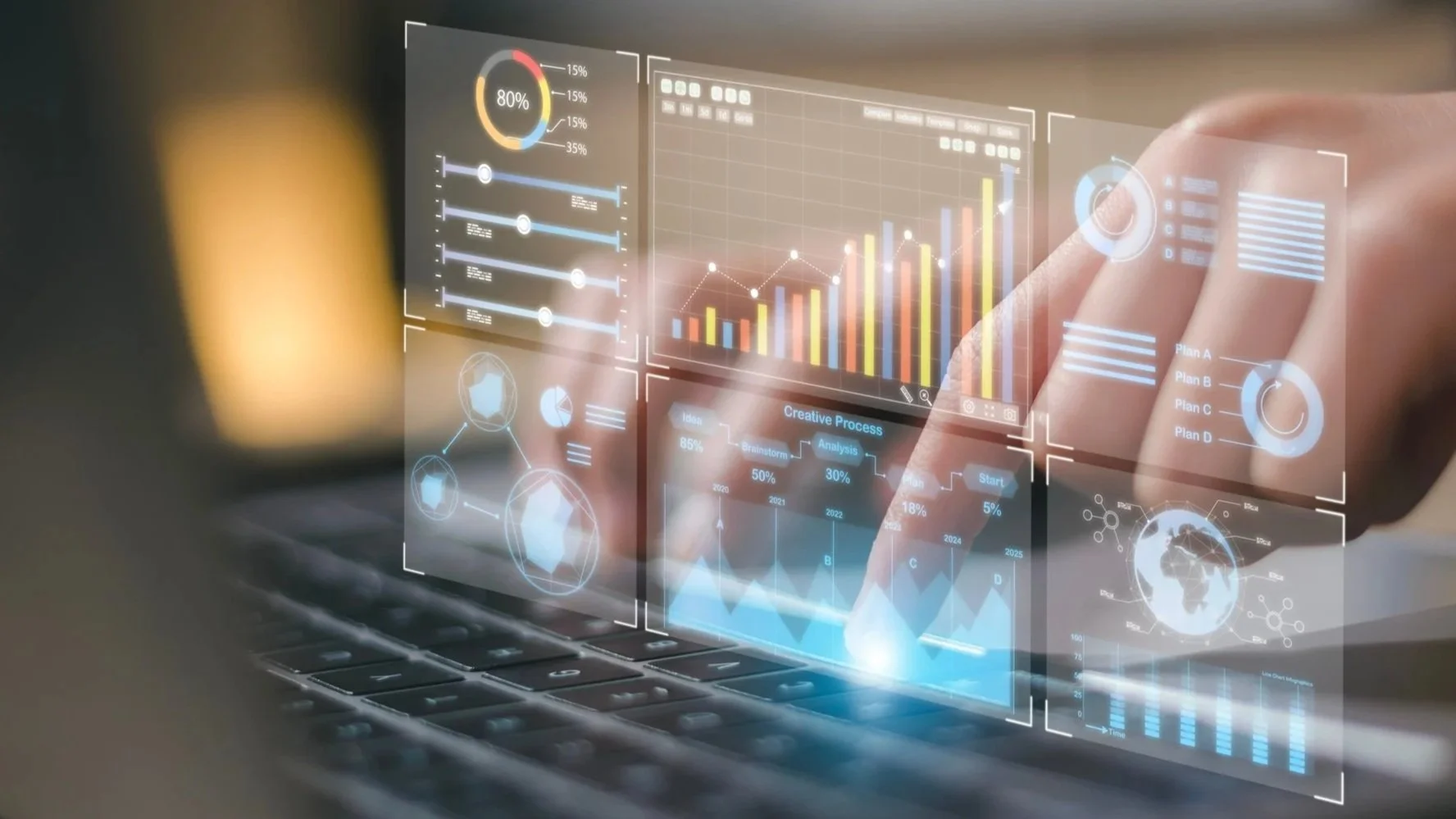 A laptop with digital analytics graphics representing visitor insights and engagement data.