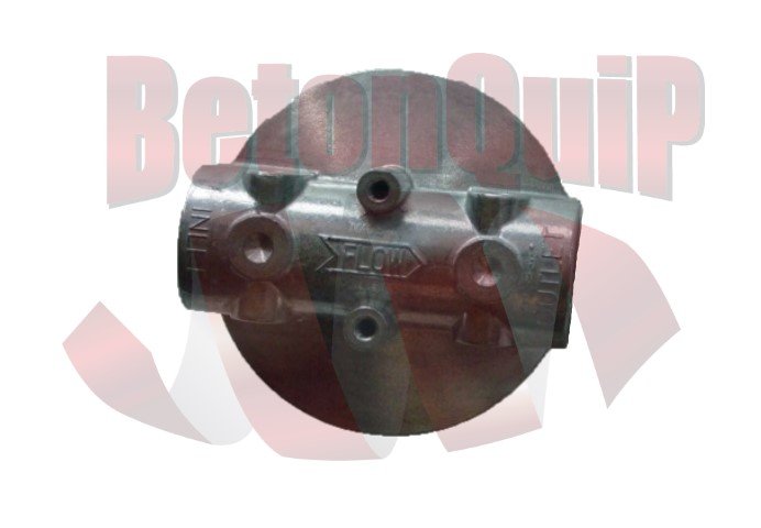 Metal engine component with multiple bolt holes and a central flange, labeled with arrows and text indicating flow direction, against a background with a partially visible logo.