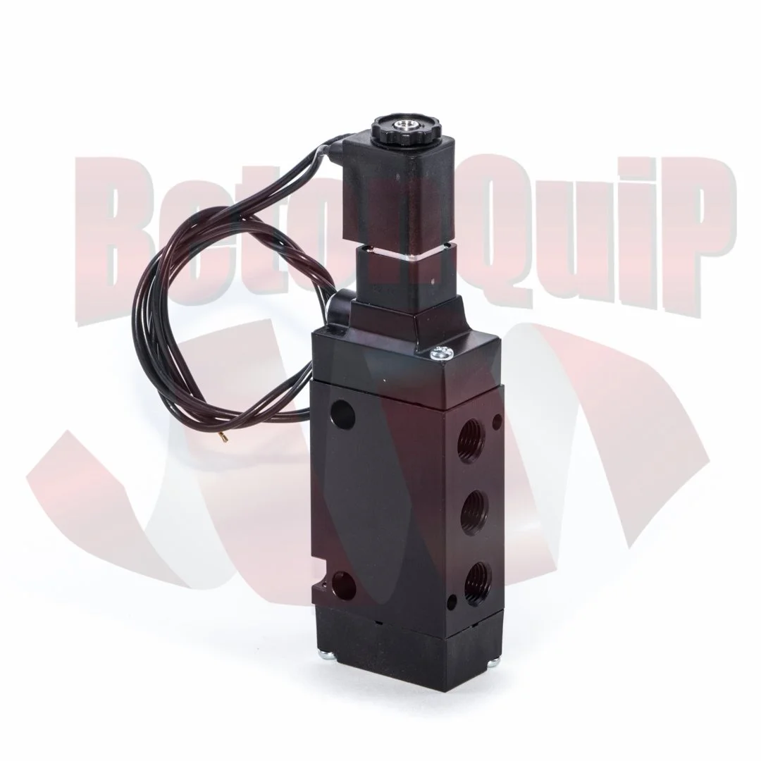 Black industrial valve with electrical wiring and multiple threaded ports, mounted with screws.