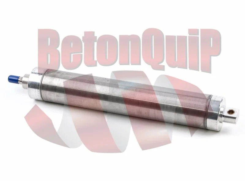 A cylindrical metal water filter in a horizontal position with threaded fittings on both ends, placed on a white background with semi-transparent red text that reads 'BetonQuip'.