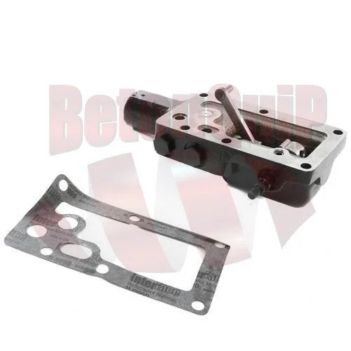 A mechanical engine component with a gasket and a piston, used in automotive or machinery applications.
