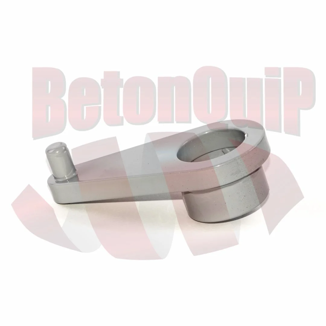 Metallic car door lock mechanism with a circular opening and a small protruding pin.