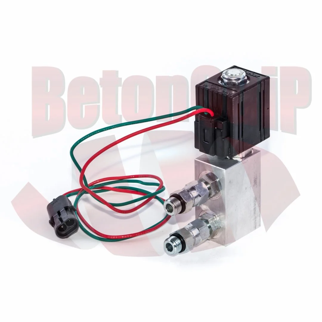 Electric solenoid valve with wires and connector, mounted on a metallic block.