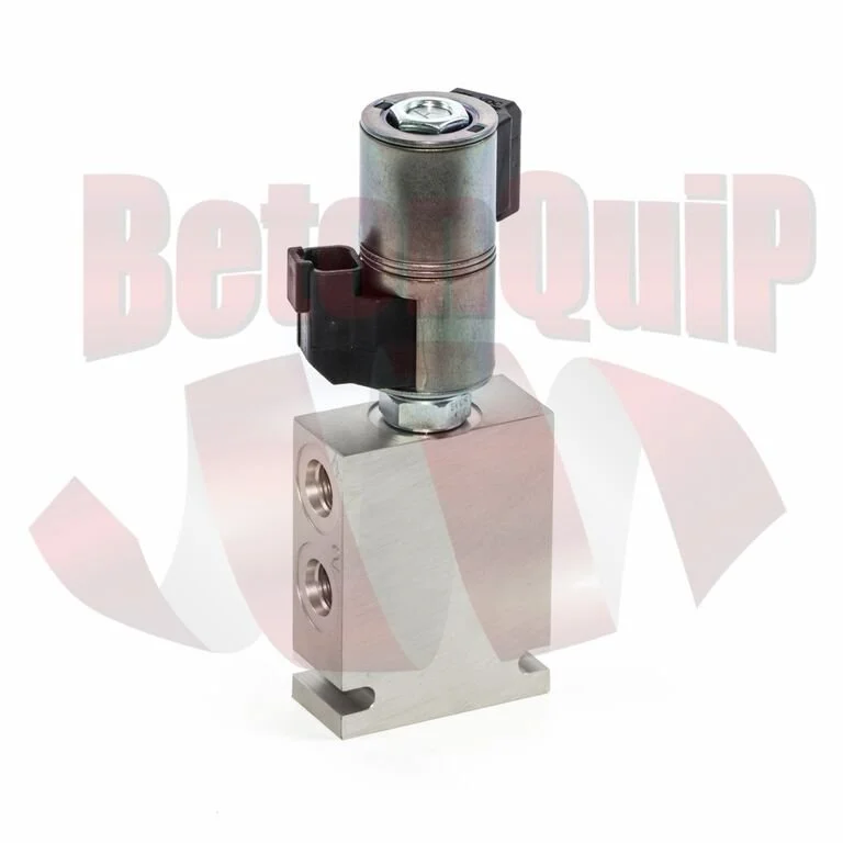 A metallic solenoid valve with a cylindrical actuator mounted on a rectangular metallic block with two ports.