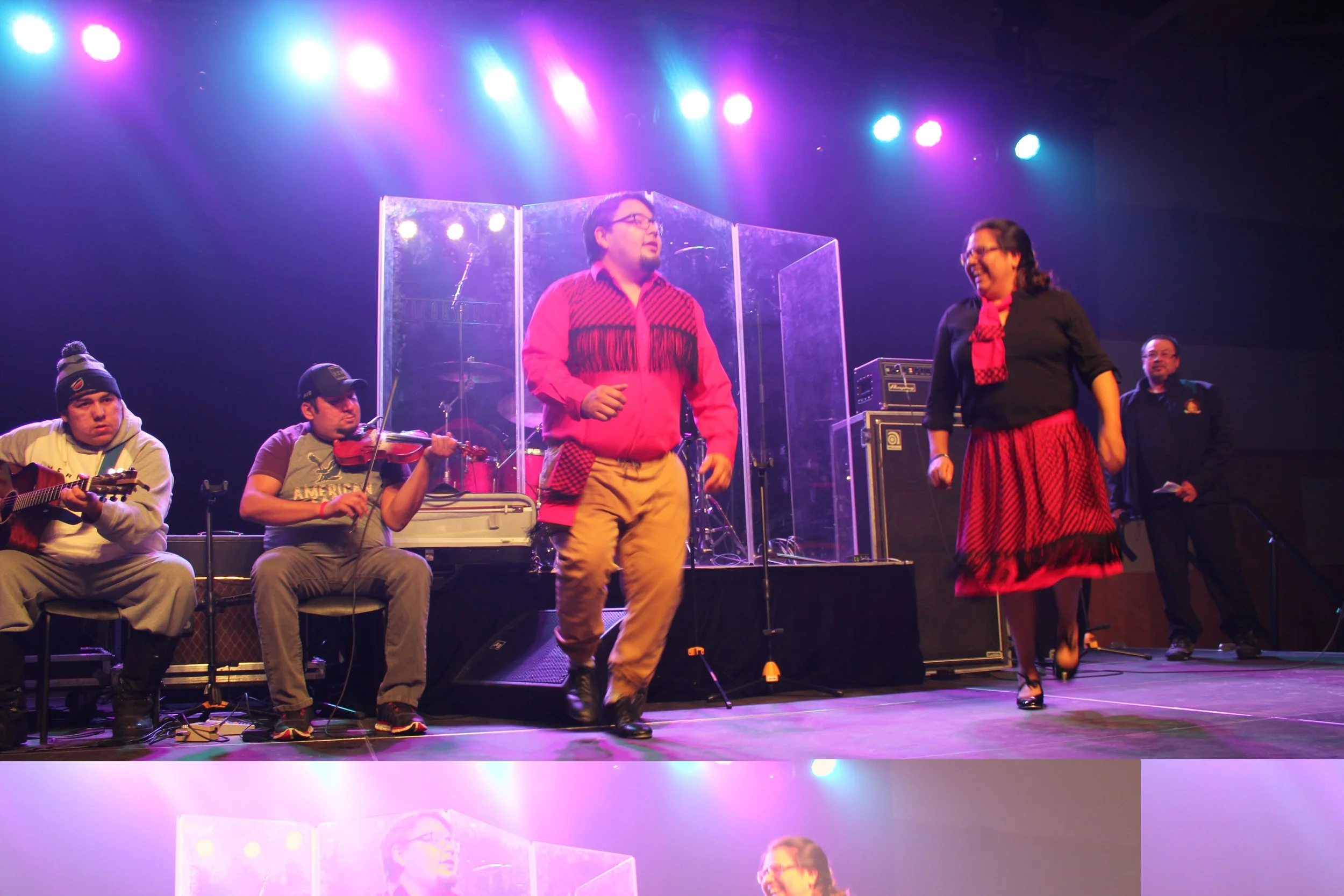 Stepdancers performing in Waskaganish, Eeyou Istchee, Québec. March 2018. Photograph by Frances Wilkins.