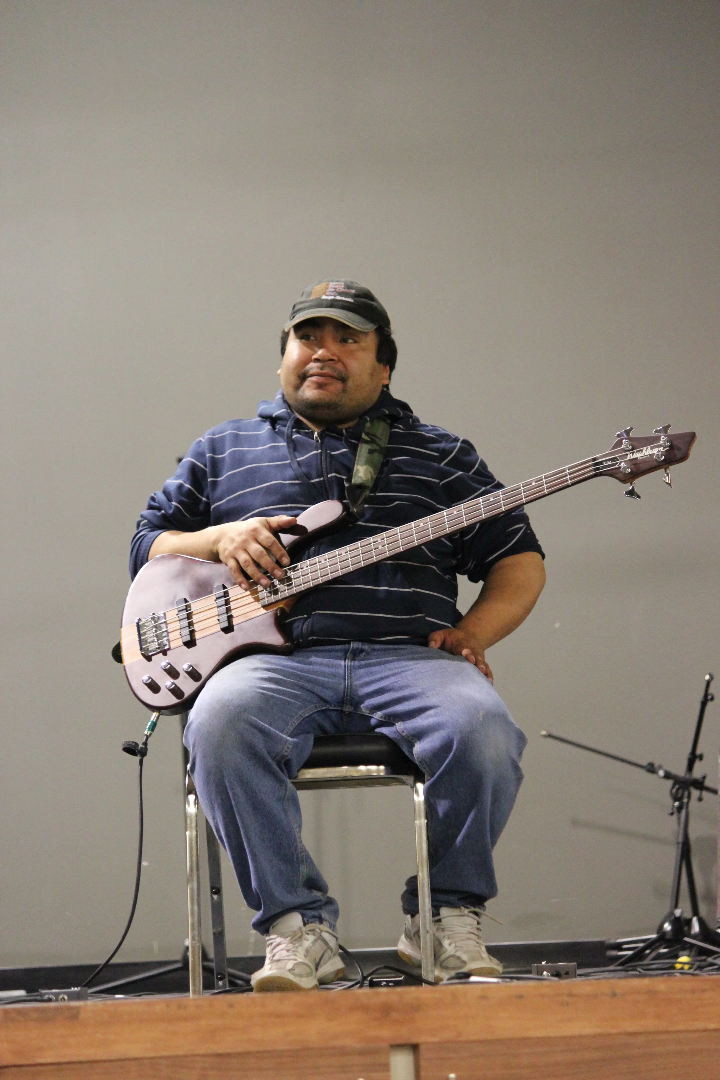 Electric guitarist performing in Wemindji, Eeyou Istchee, Québec. November 2011. Photograph by Frances Wilkins.