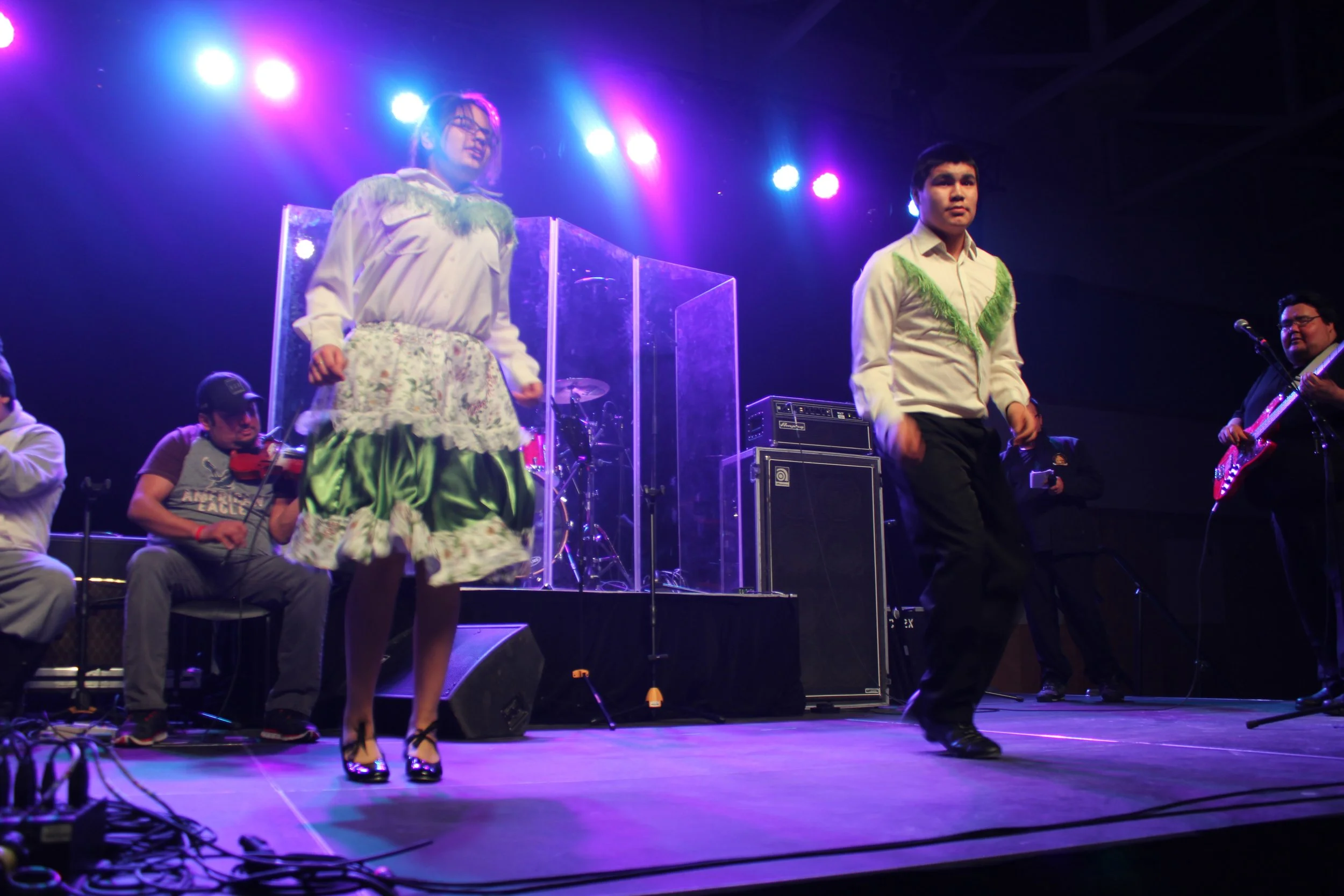 Stepdancers performing in Waskaganish, Eeyou Istchee, Québec. March 2018. Photograph by Frances Wilkins.
