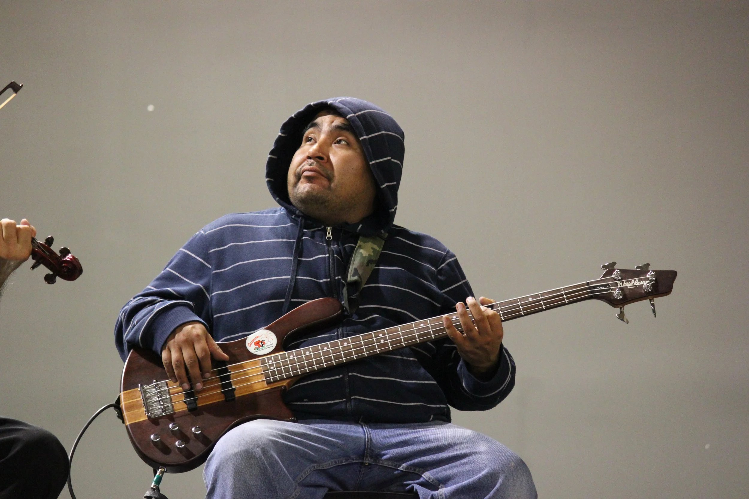 Electric guitarist performing in Wemindji, Eeyou Istchee, Québec. November 2011. Photograph by Frances Wilkins.
