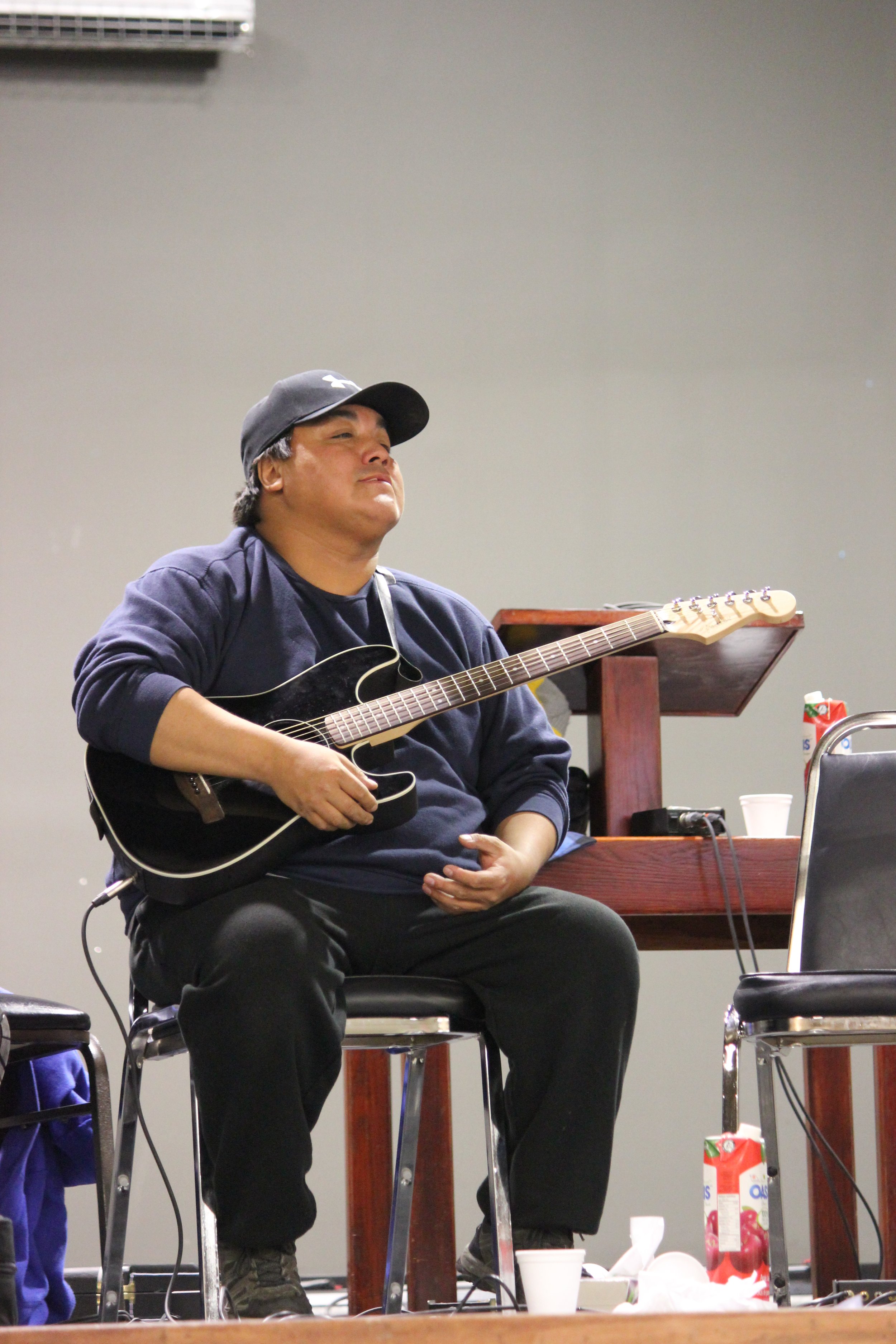 Roy Ratt performing in Wemindji, Eeyou Istchee, Québec. November 2011. Photograph by Frances Wilkins.