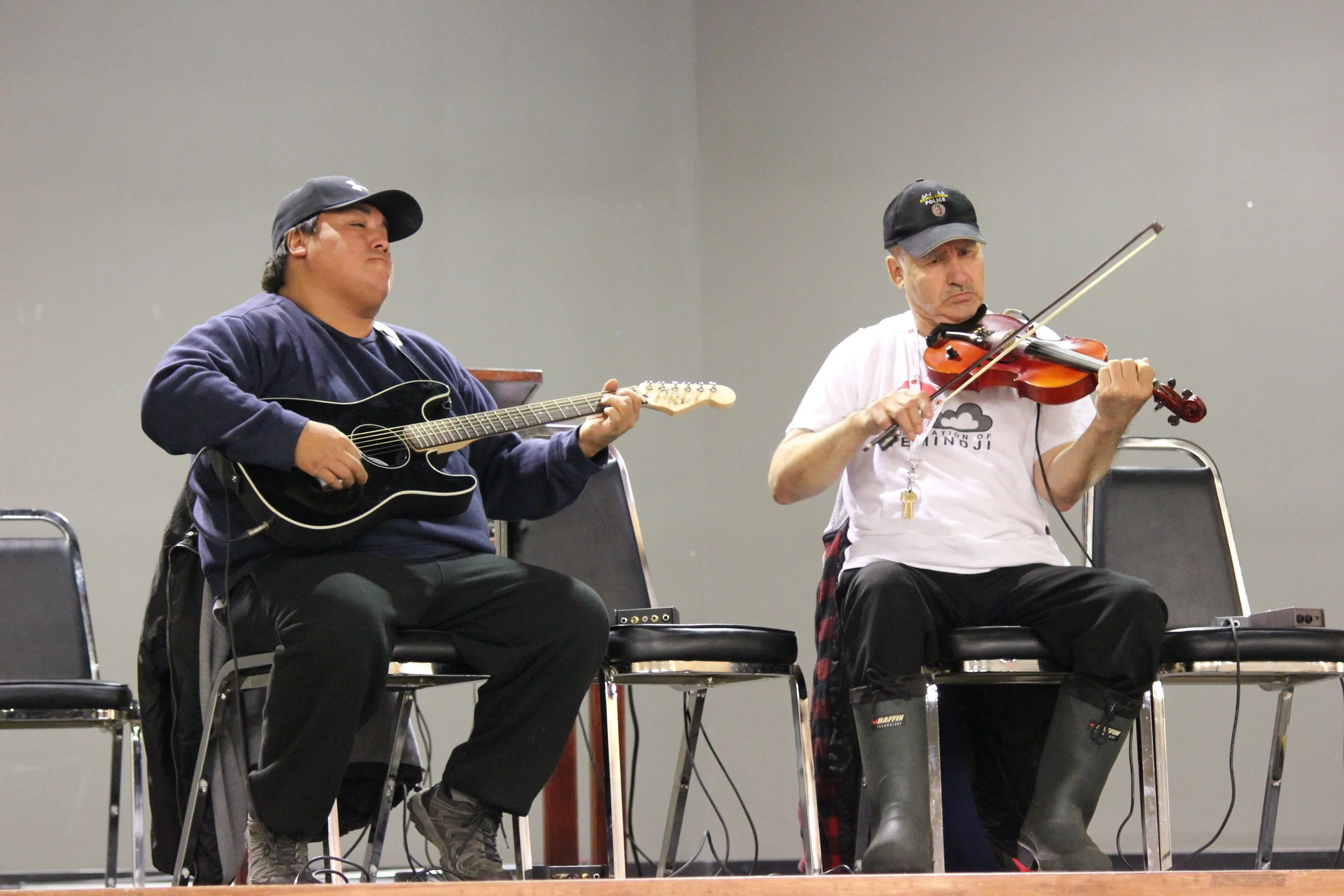 Roy Ratt and Bobby Georgekish performing in Wemindji, Eeyou Istchee, Québec. November 2011. Photograph by Frances Wilkins.