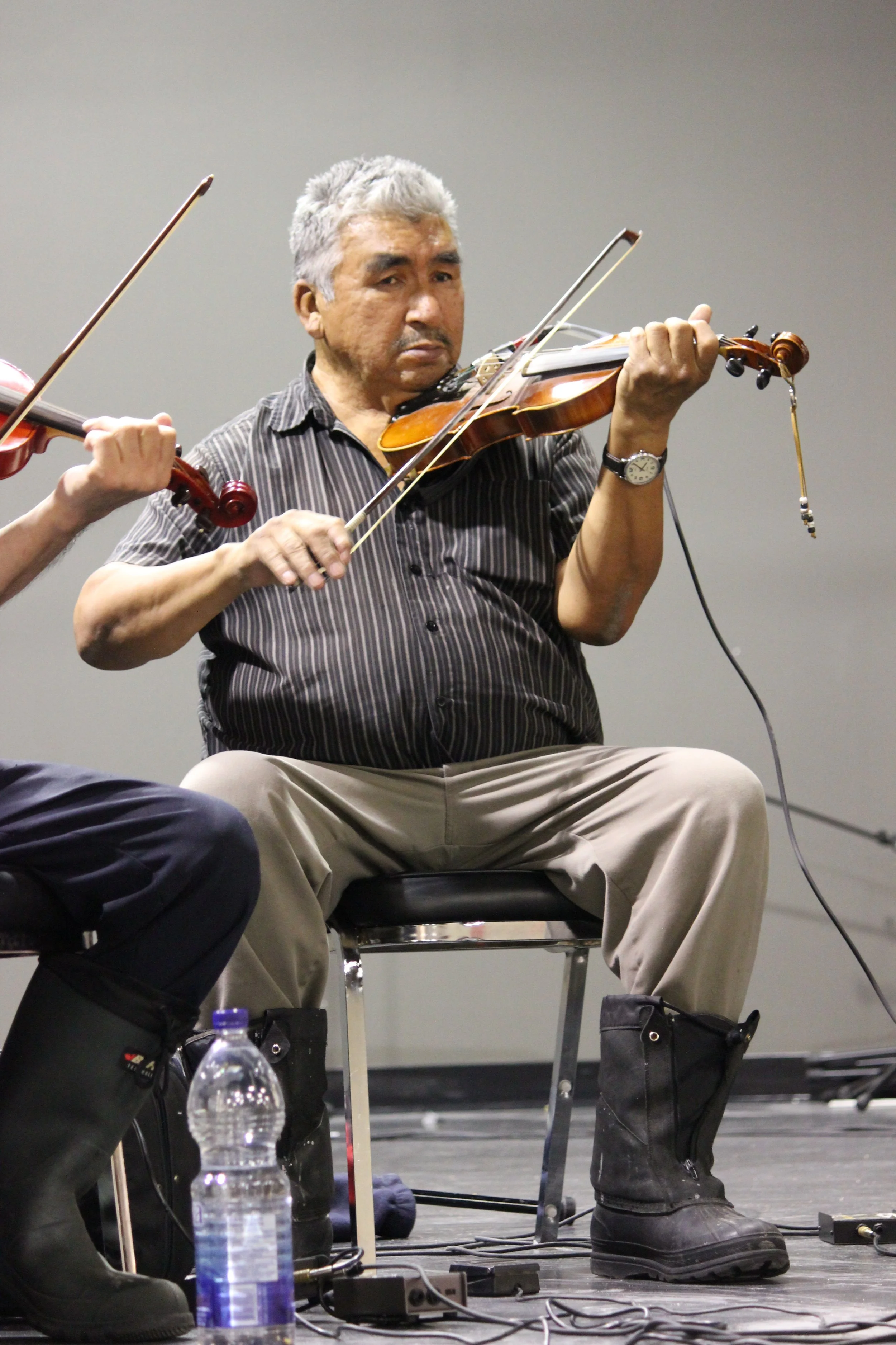 James Stewart performing in Wemindji, Eeyou Istchee, Québec. November 2011. Photograph by Frances Wilkins.