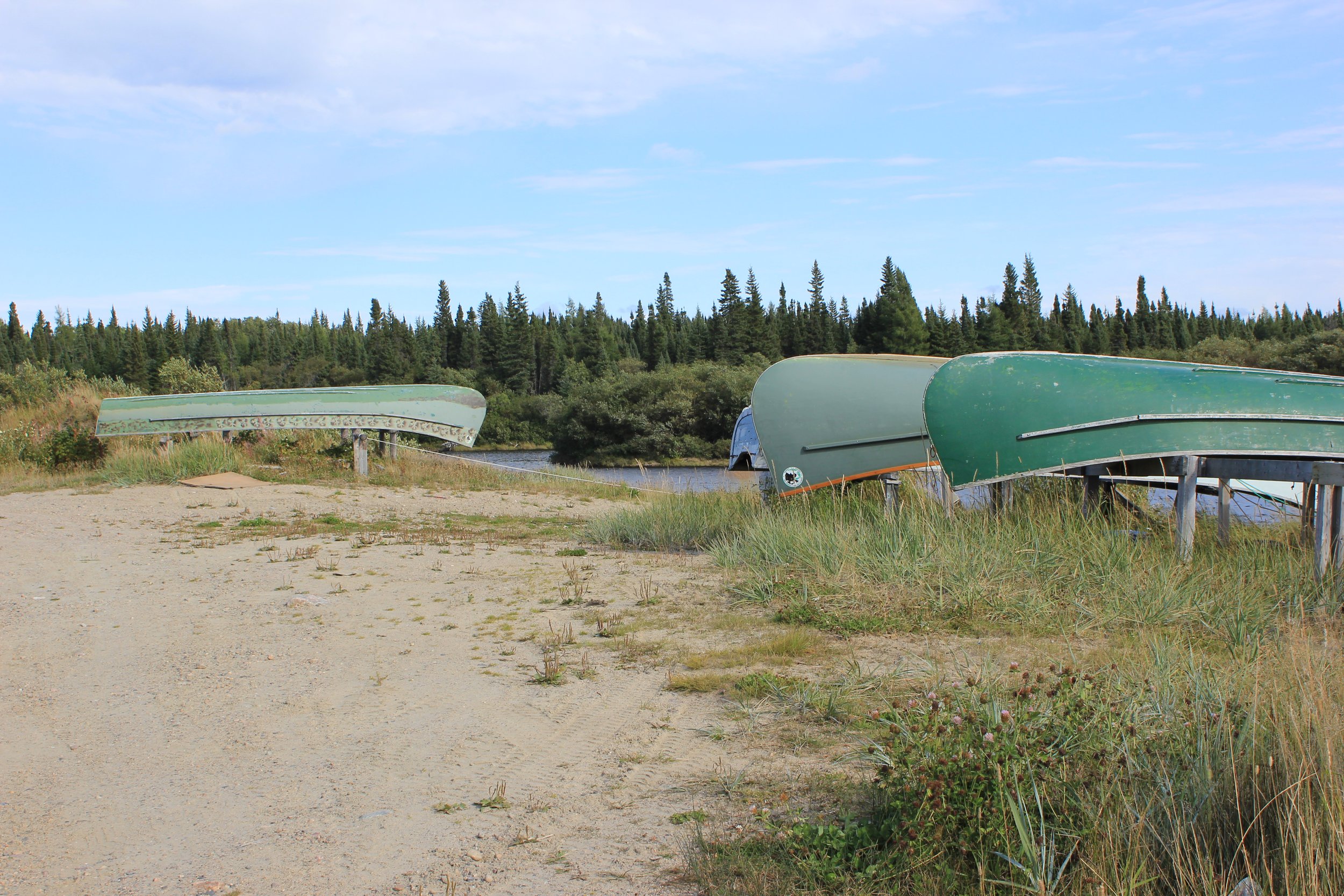 Canoes in Wemindji, Eeyou Istchee, Québec. September 2012. Photograph by Frances Wilkins.
