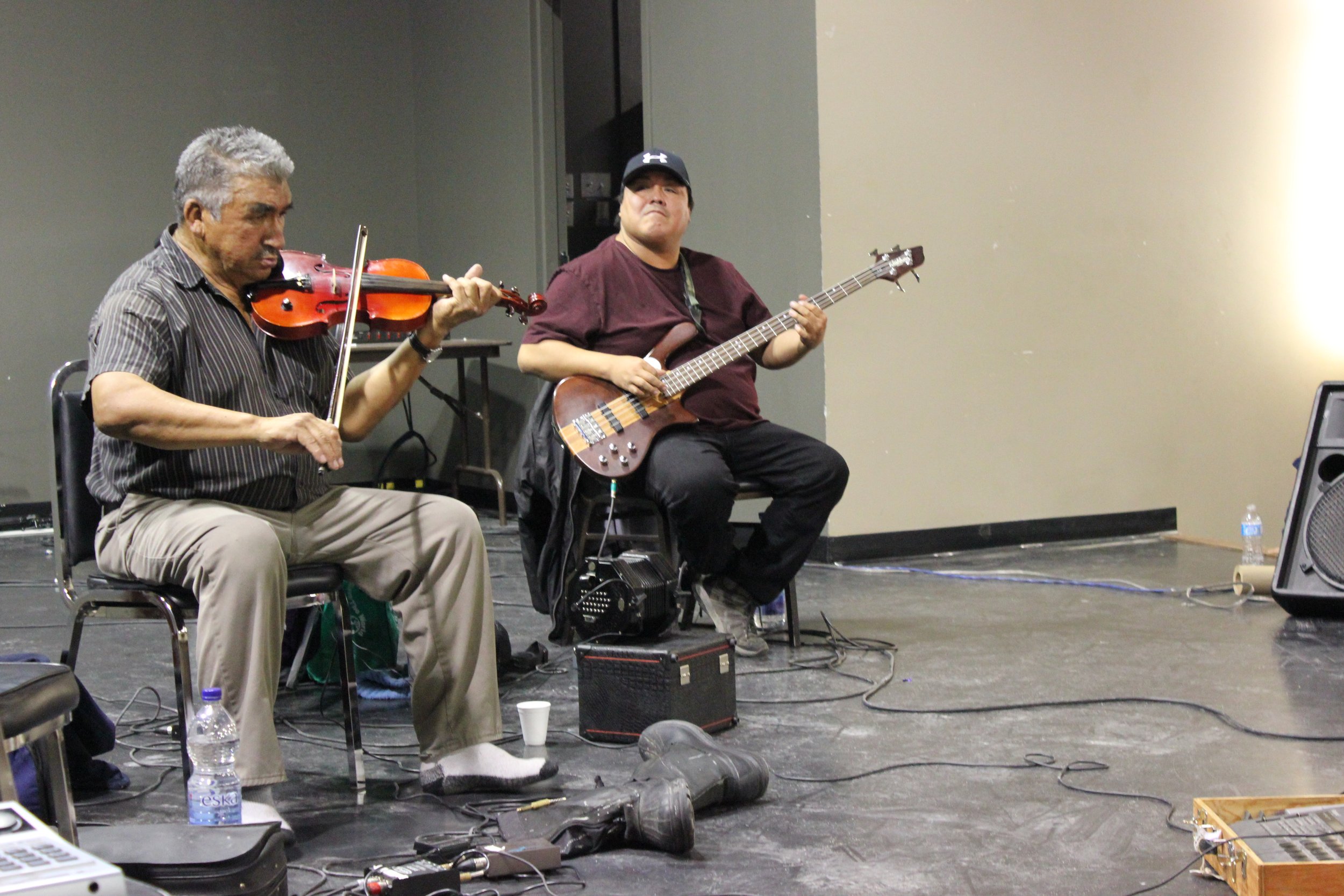James Stewart and Roy Ratt performing in Wemindji, Eeyou Istchee, Québec. November 2011. Photograph by Frances Wilkins.
