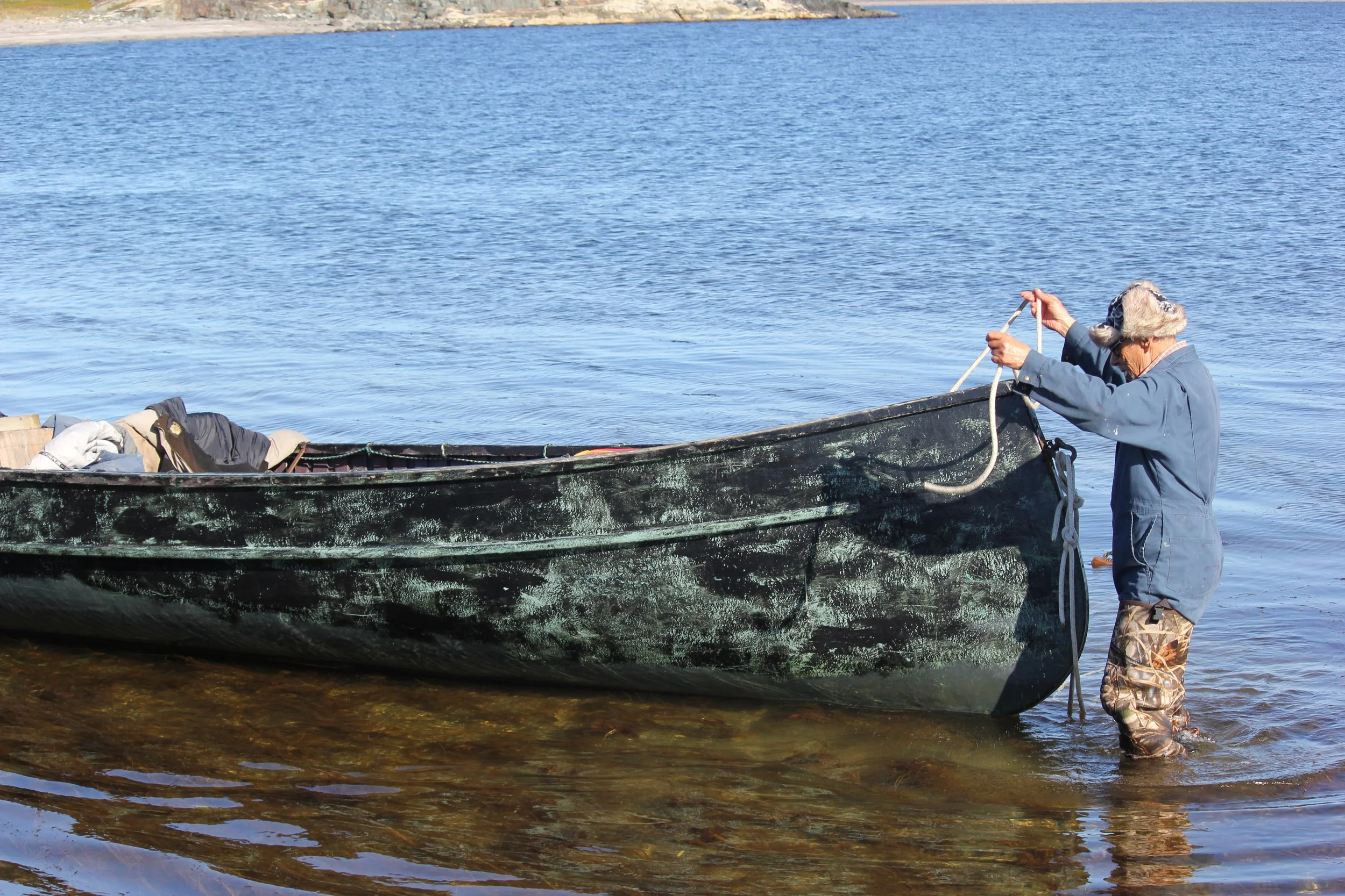 George Kudlu with canoe, James Bay, near Wemindji, Eeyou Istchee, Québec. September 2012. Photograph by Frances Wilkins.