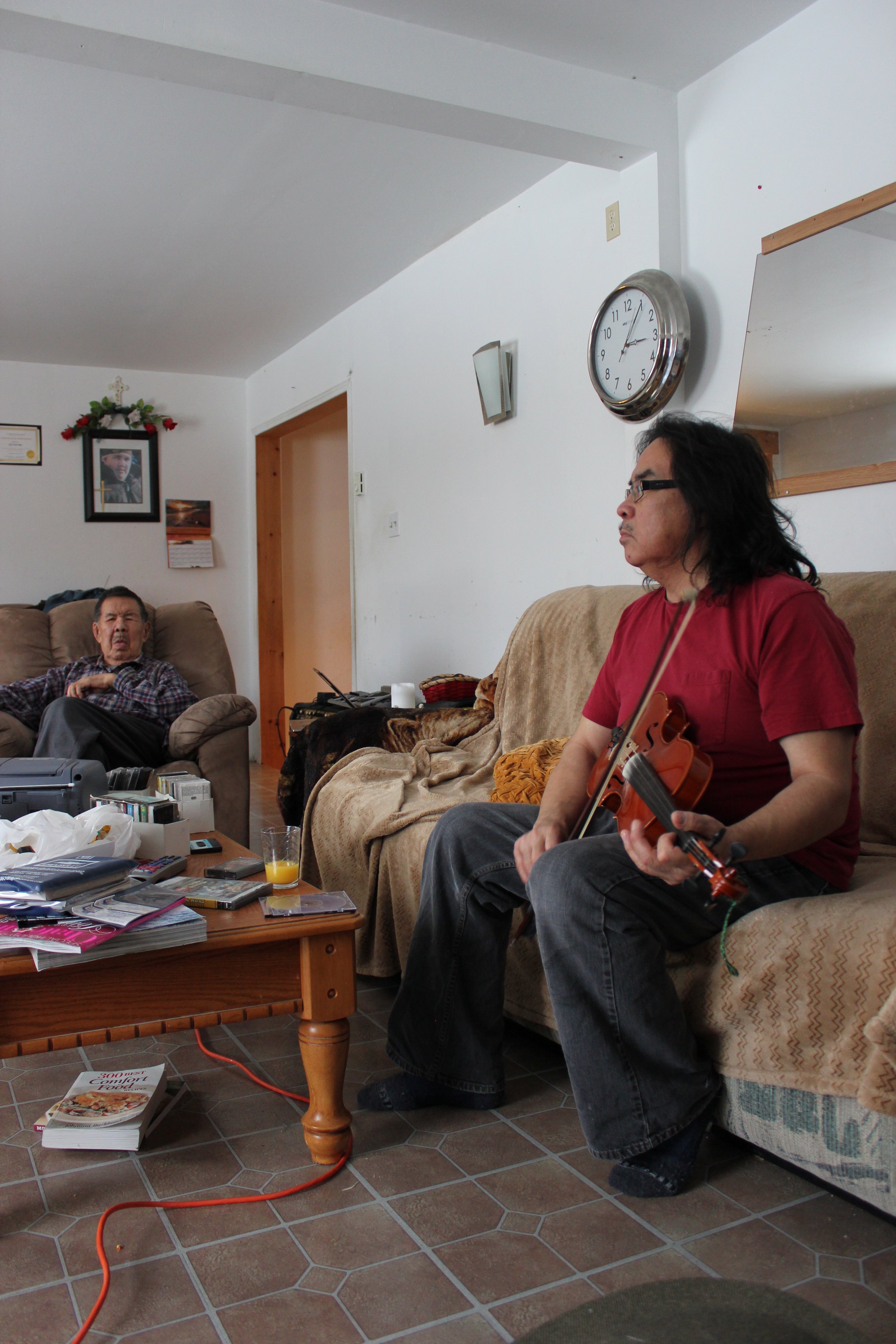 Thomas Jolly sr and Thomas Jolly jr, musicians, Moose Factory, Northern Ontario, December 2011. Photograph by Frances Wilkins. 