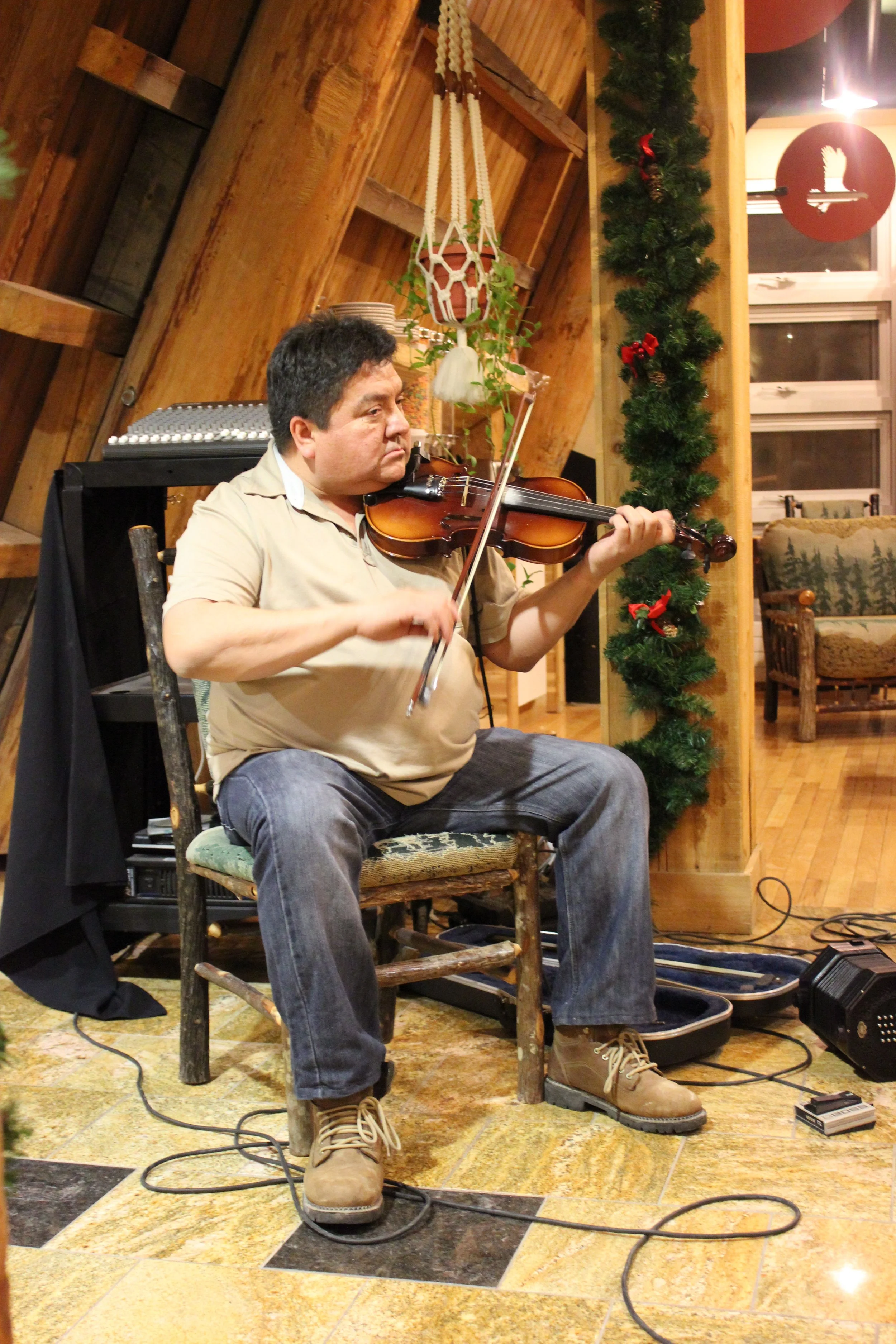 Victor Weapenicappo, fiddler, Cree Village Ecolodge, Moose Factory, Northern Ontario, December 2011. Photograph by Frances Wilkins. 