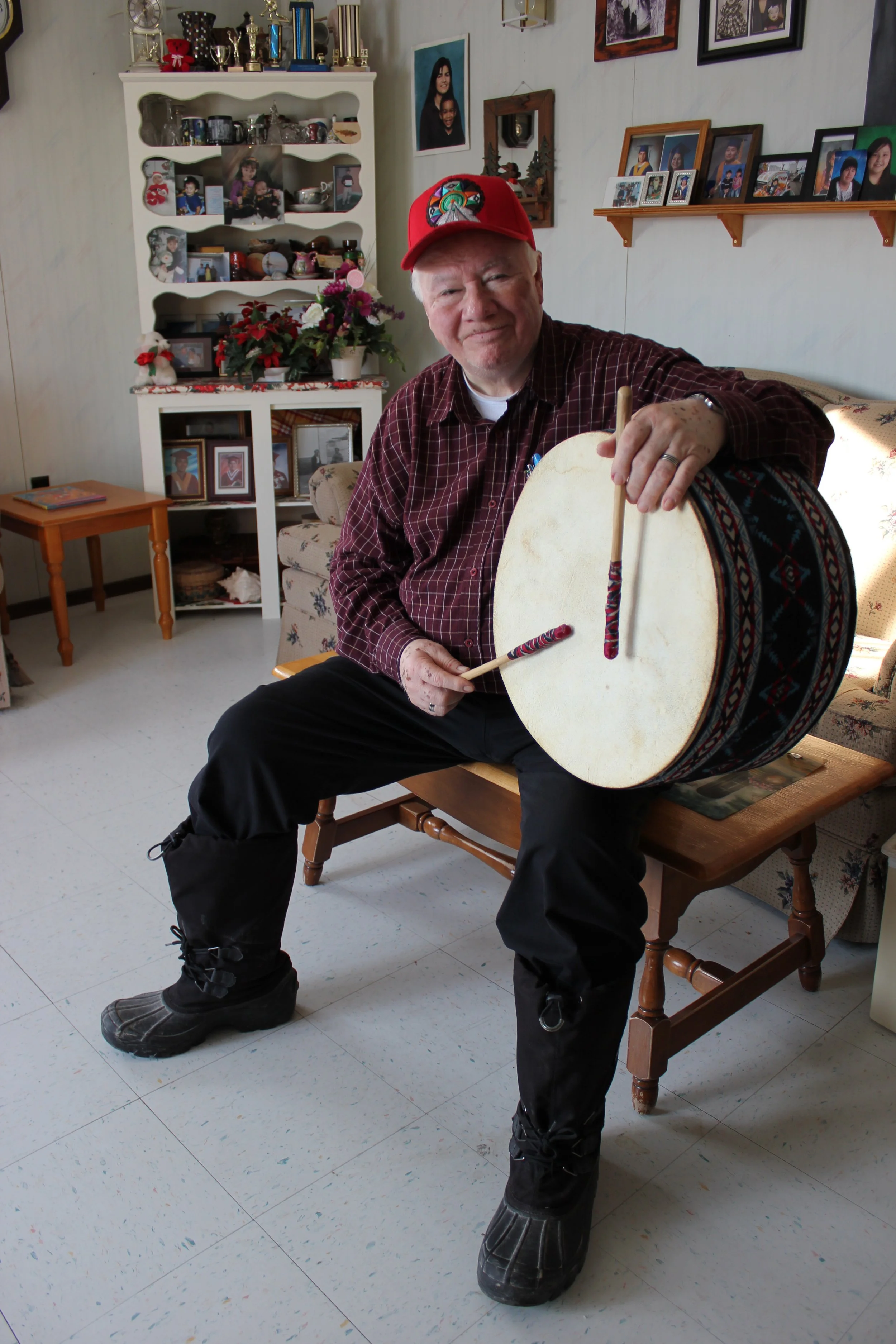 James Cheechoo playing the moose hide drum, Moose Factory, Northern Ontario, December 2011. Photograph by Frances Wilkins. 