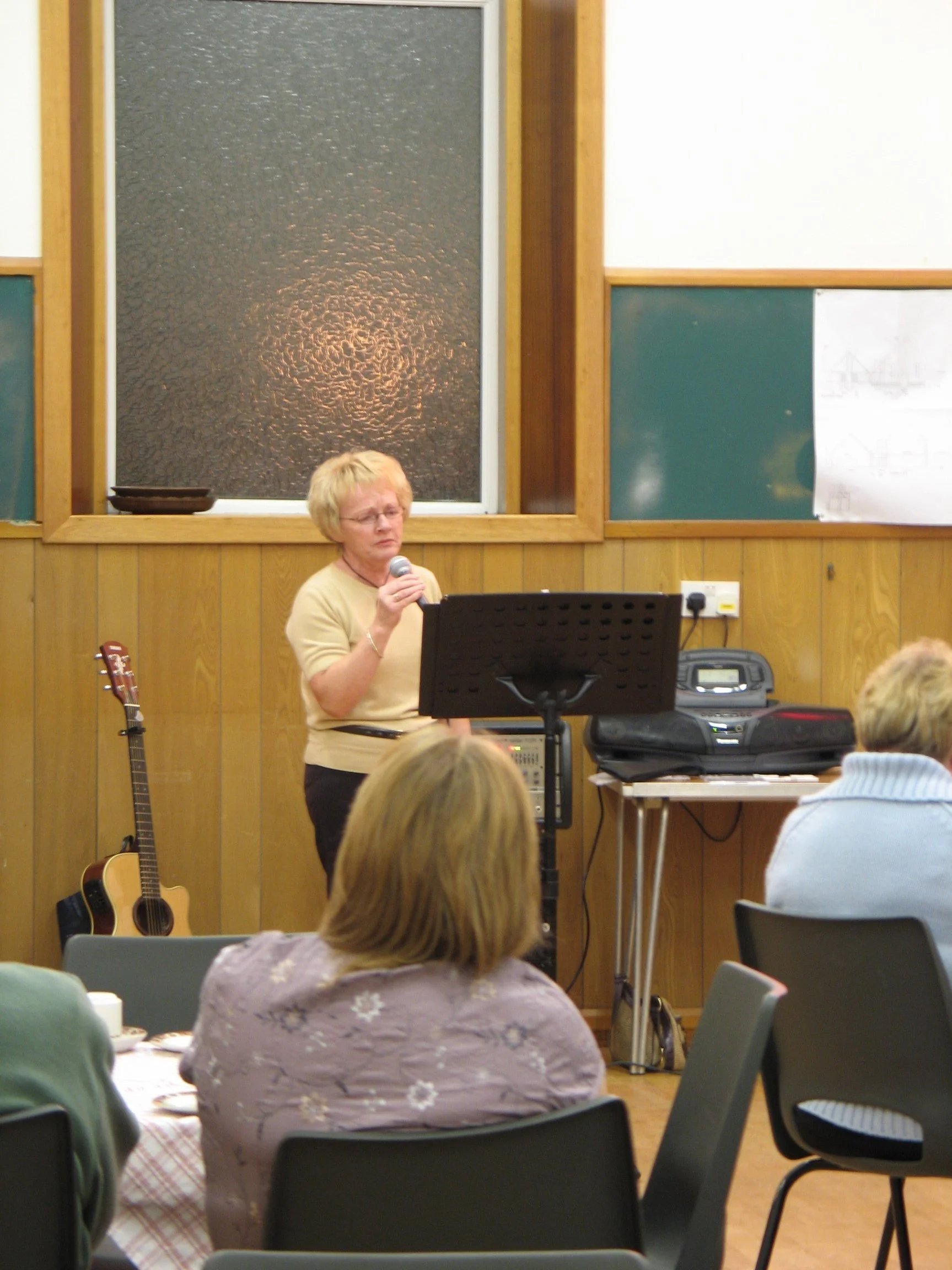 Elma Wilkins singing at the Ladies Guild, Lossiemouth Baptist Church, Aberdeenshire, October 2006. Photograph by Frances Wilkins. 