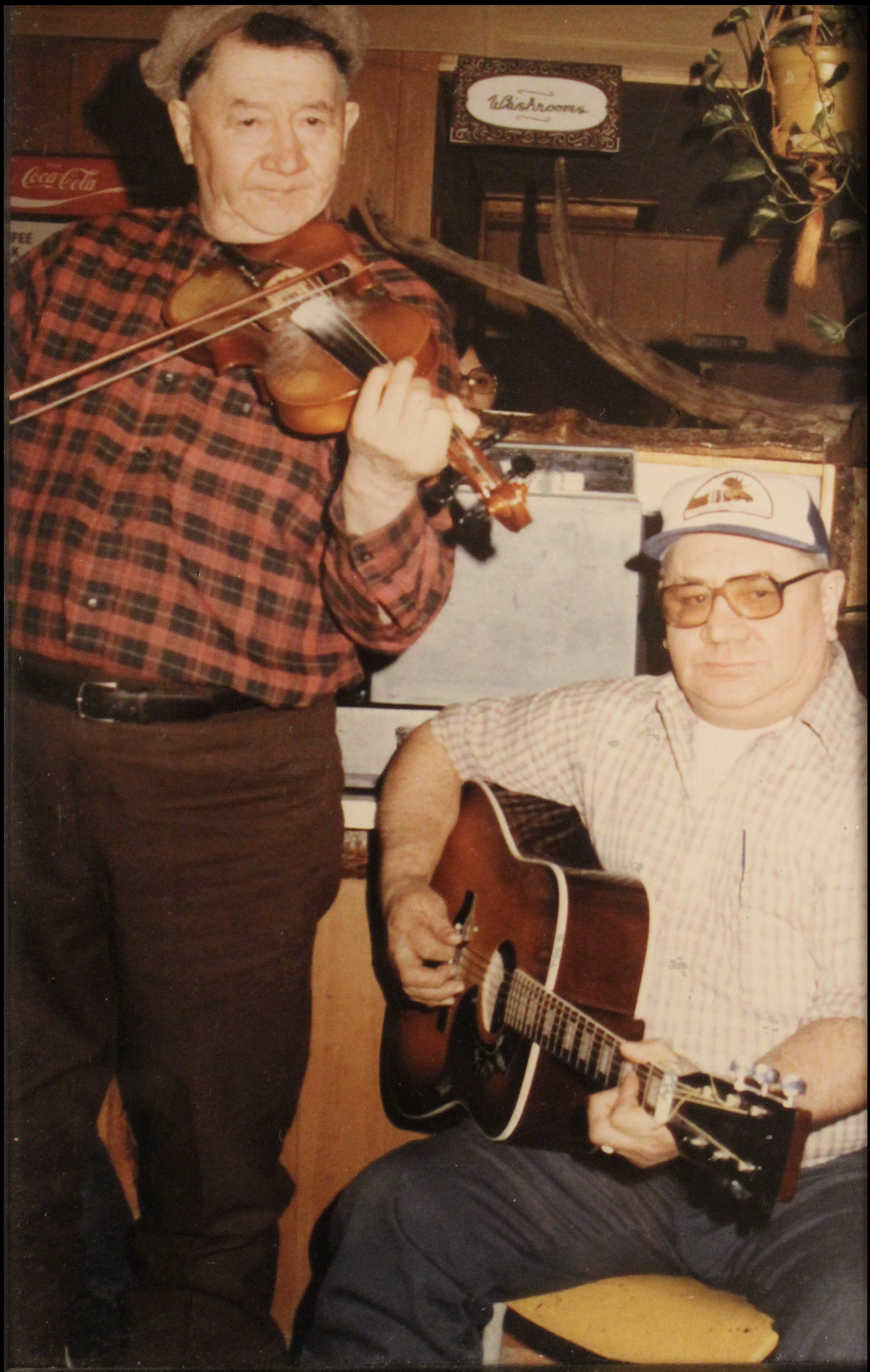 Robert McLeod, fiddler, and Billy Corston, guitarist, Moose Factory, Northern Ontario [n.d.]. Photographer unknown.