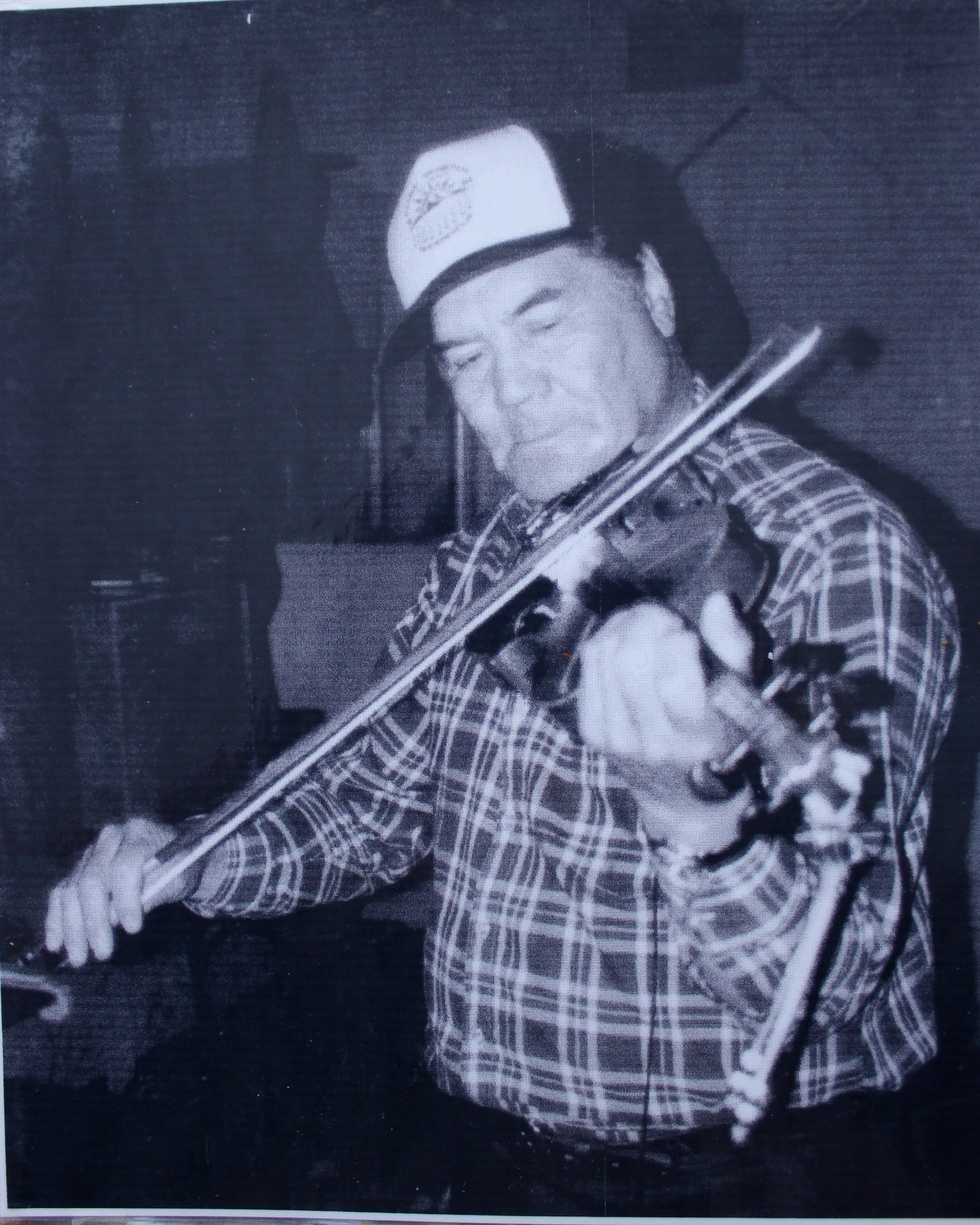 Clarence Louttit, fiddler, Moose Factory, Northern Ontario [n.d.]. Photographer unknown.