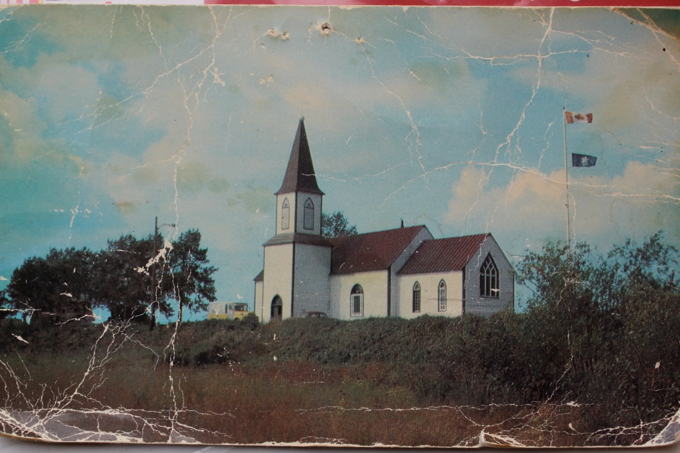 Postcard of the Anglican Church, Moose Factory. Photographer unknown.