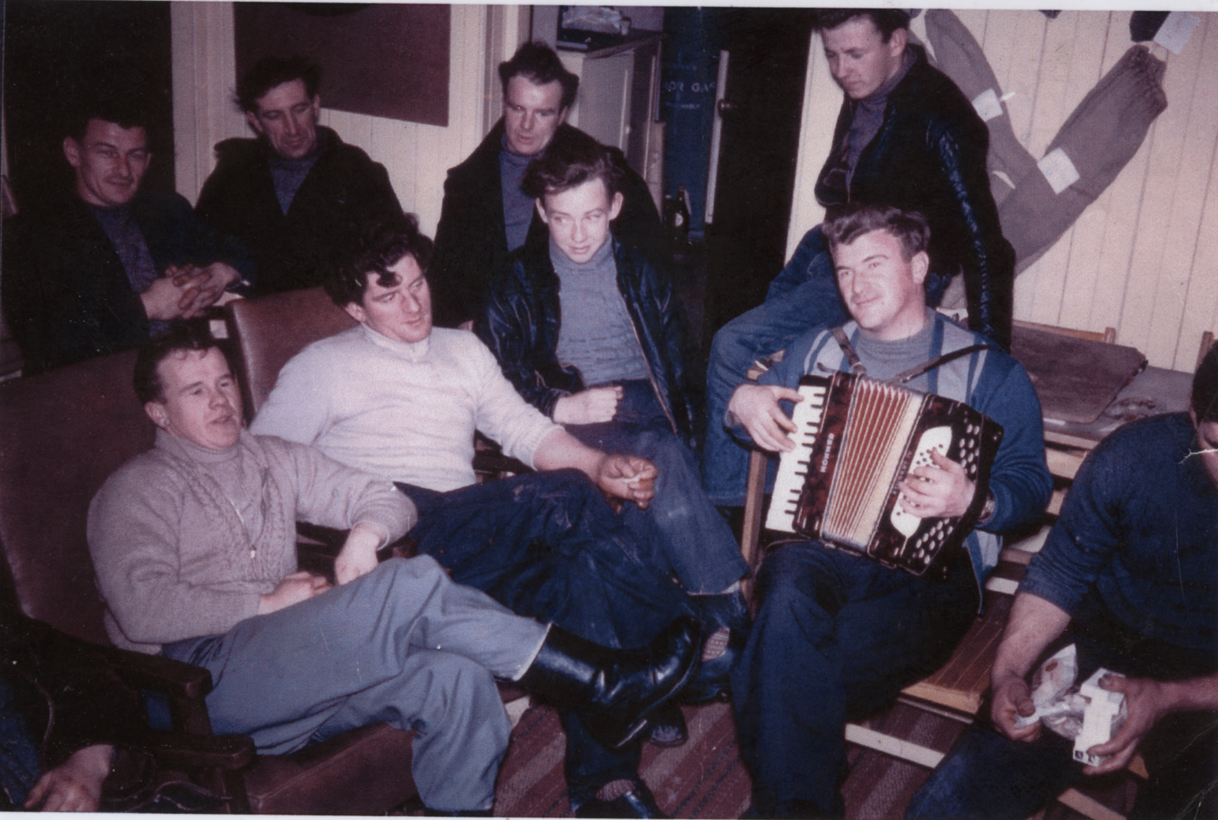George Watt and the crew of the 'Ocean Star' singing gospel hymns in Kinlochbervie Deep Sea Mission, c1960. Photo courtesy of Irene Watt.