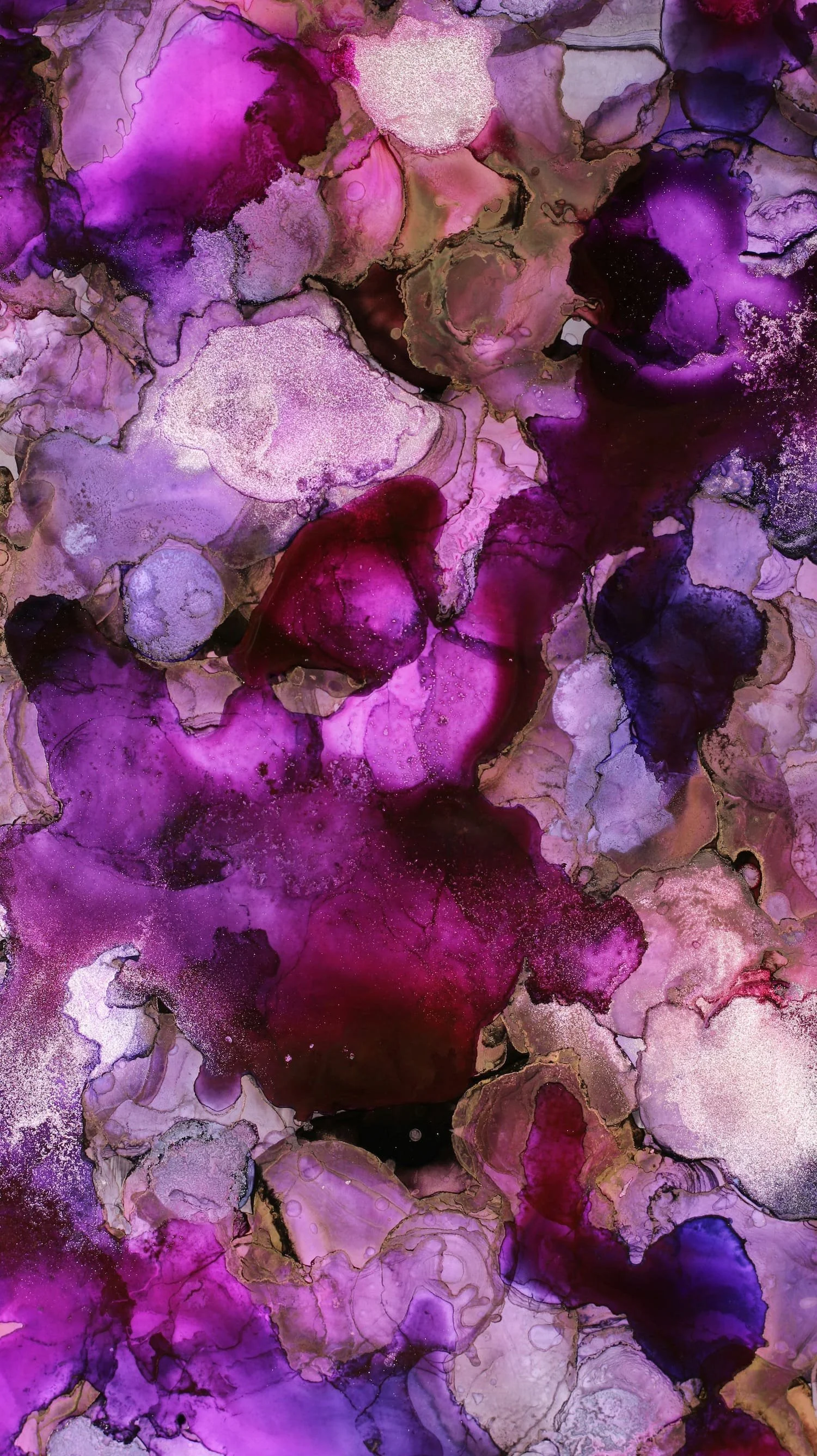 Abstract artwork with swirling shades of purple, pink, and gold, resembling a marbled effect.