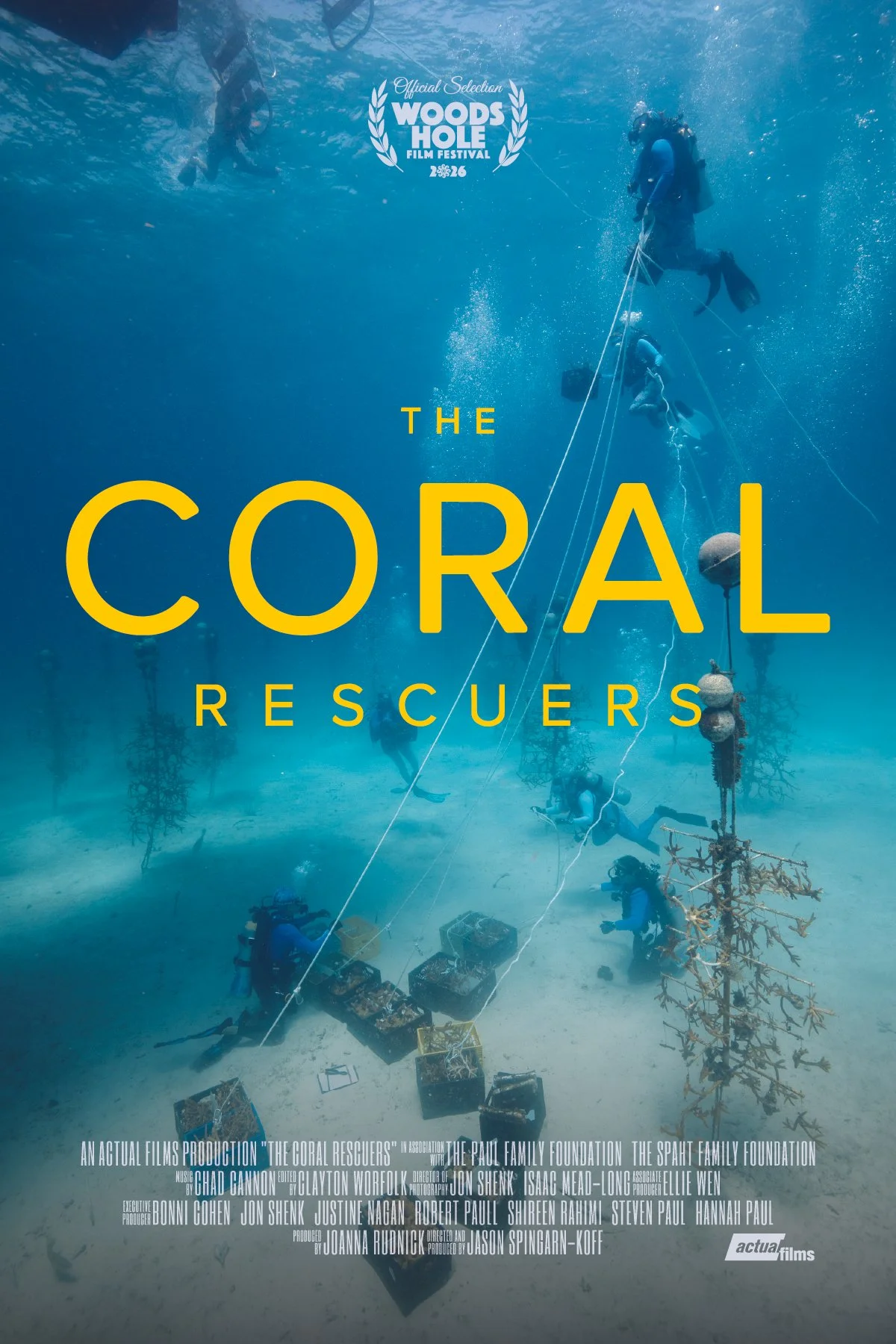 Underwater scene showing divers and rescue efforts involving coral reefs, with large yellow text reading 'The Coral Rescuers' and a logo for Woods Hole Film Festival.