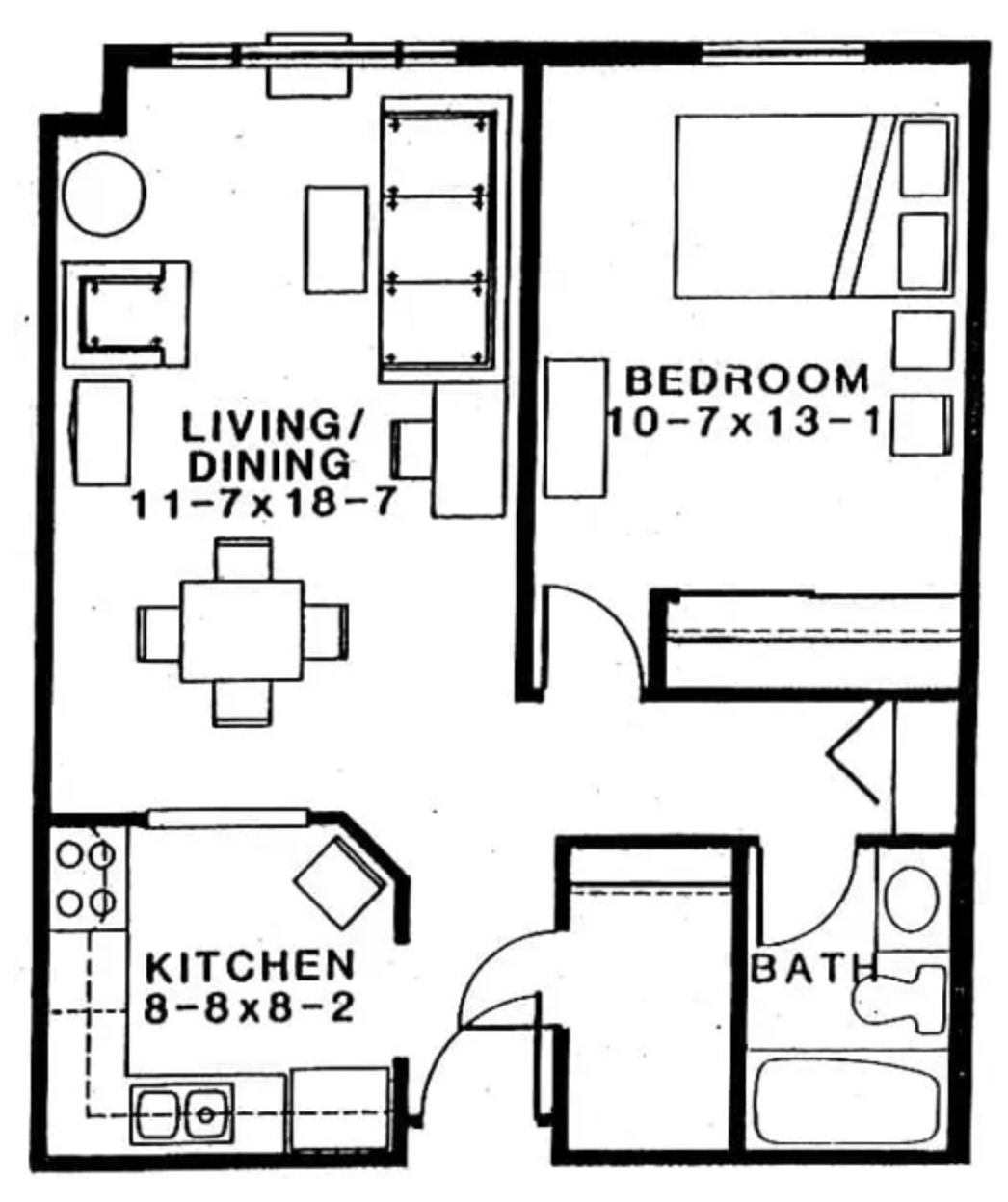 Black and white floor plan of a one-bedroom apartment including a living/dining area, kitchen, bedroom, and bathroom.