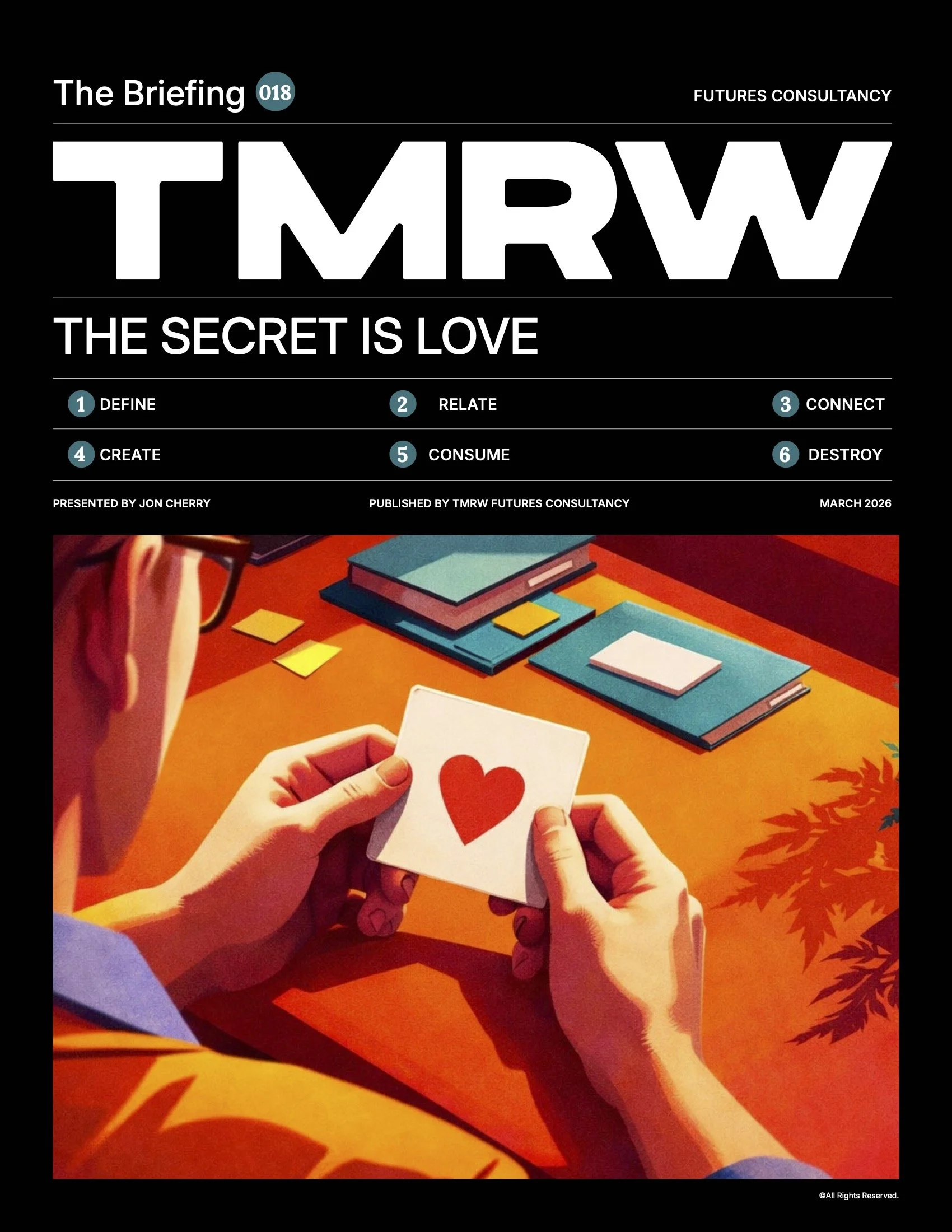 The image shows two hands holding a playing card with a red heart symbol on it. The background includes a colorful table with neatly stacked books and some scattered yellow notes, and a person's arm is partially visible.
