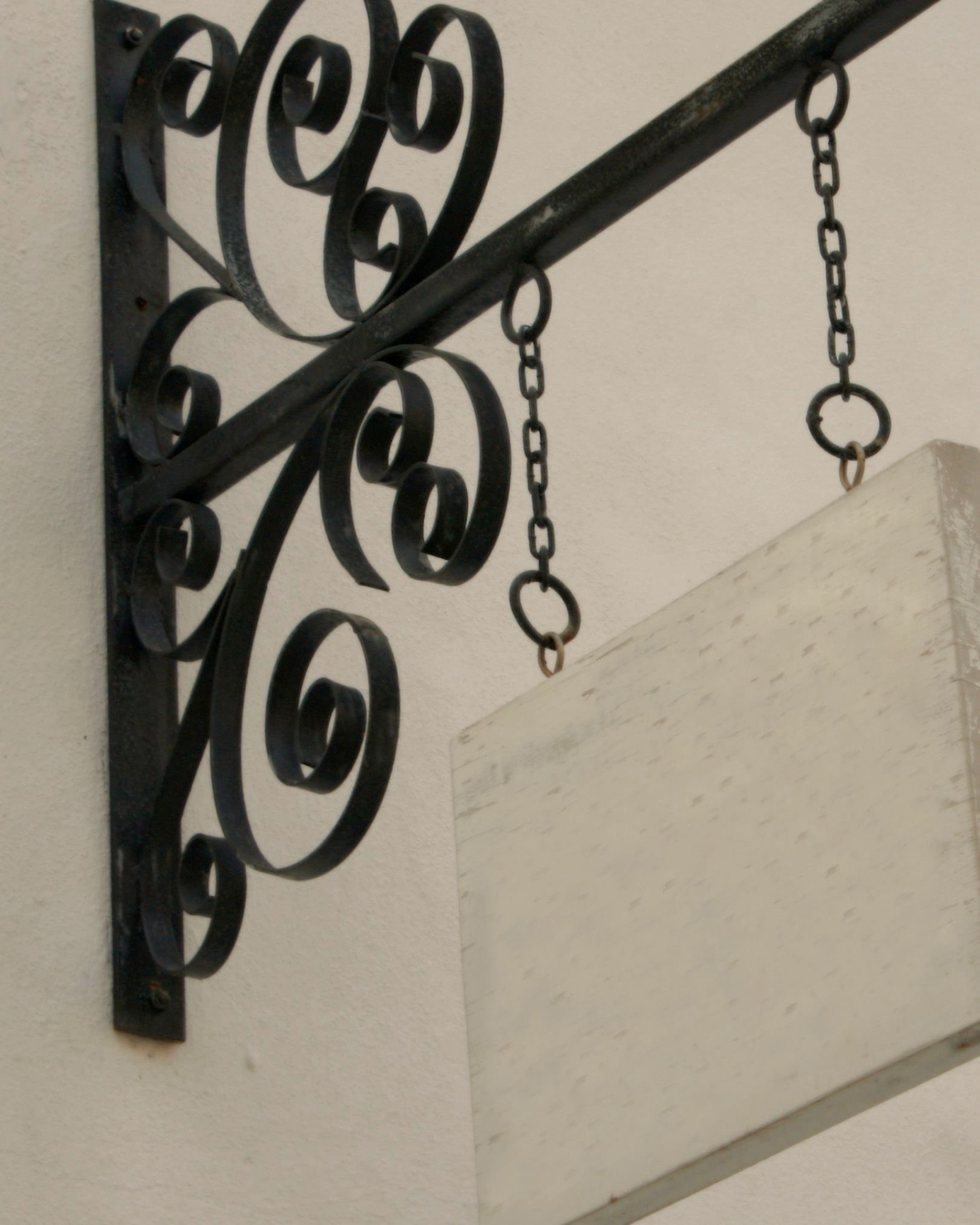 Luxury storefront custom signage designed for branding. Artisan details
