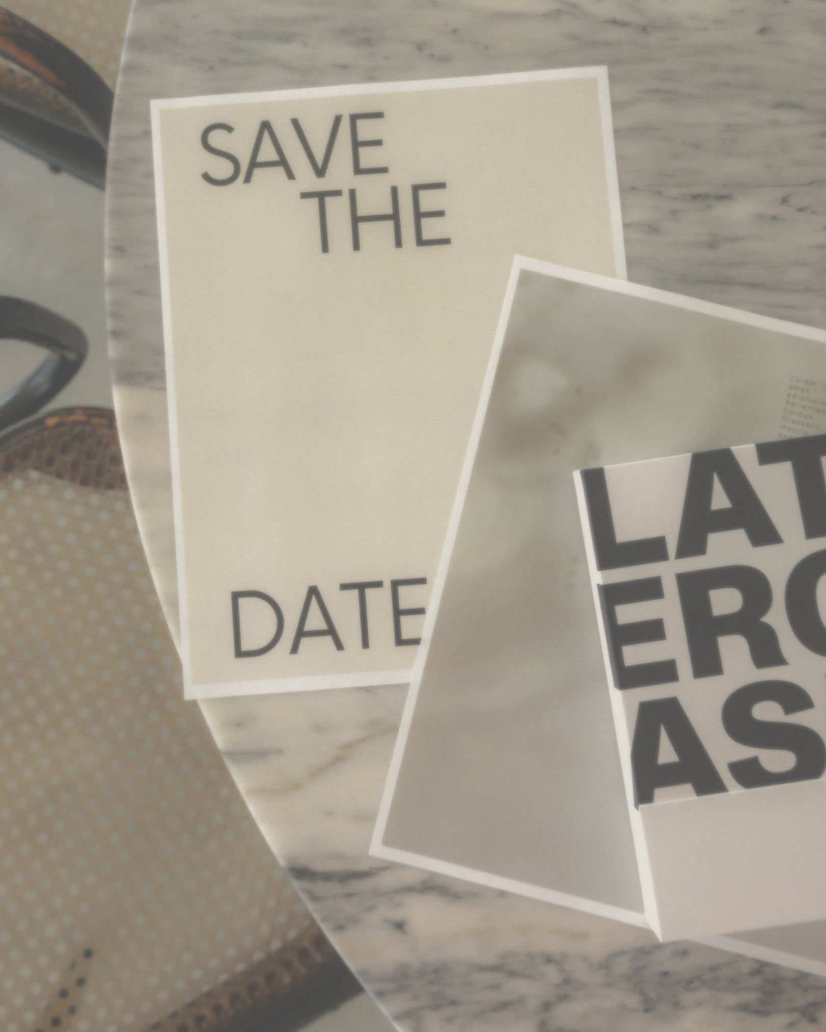 High-end print design featuring typography and premium paper textures. Minimalist printed marketing collateral and branded paper materials.
