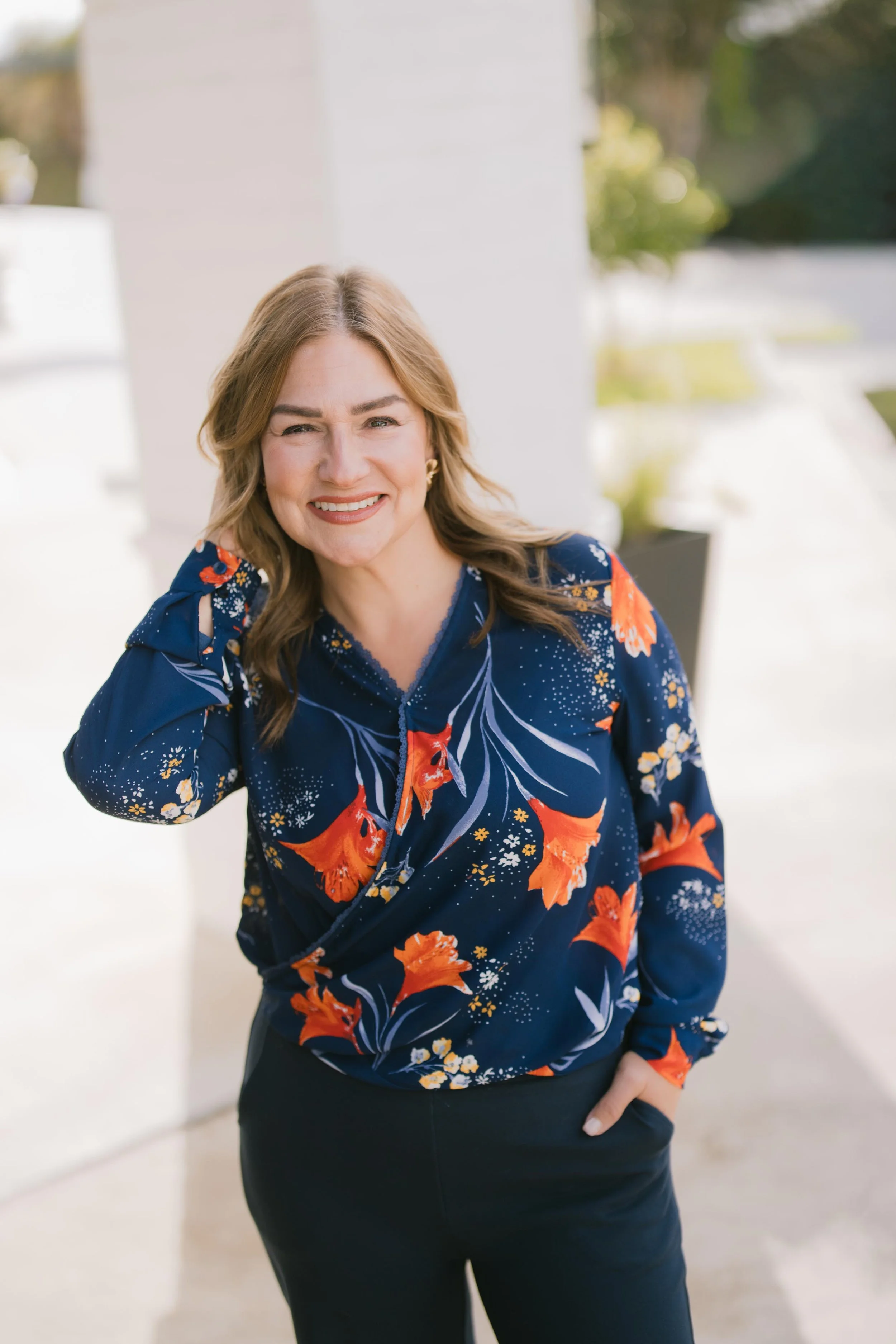Jaime Lasch smiling outside Her Nova Wellness