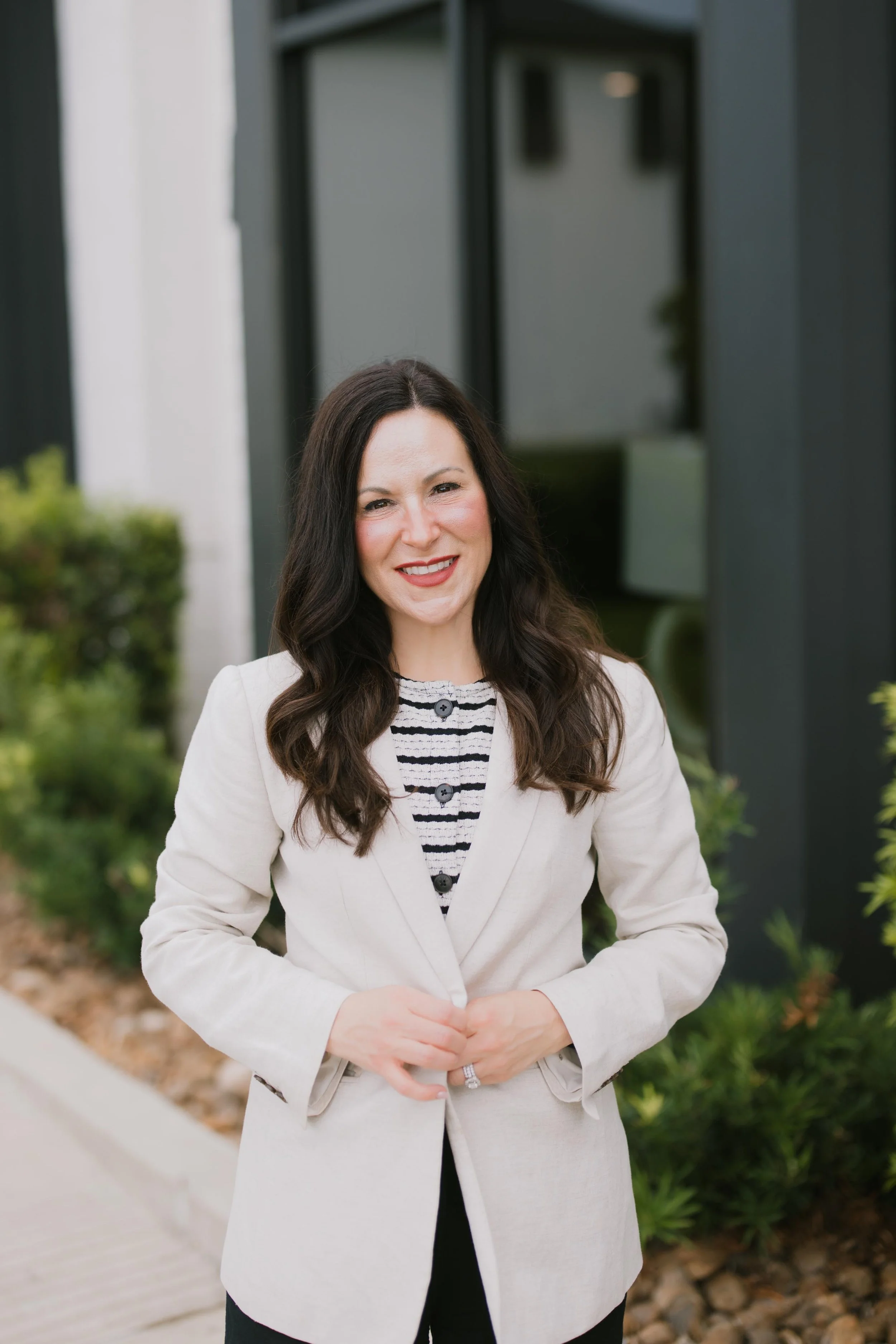 Dr. Ammons smiling outside Her Nova Wellness