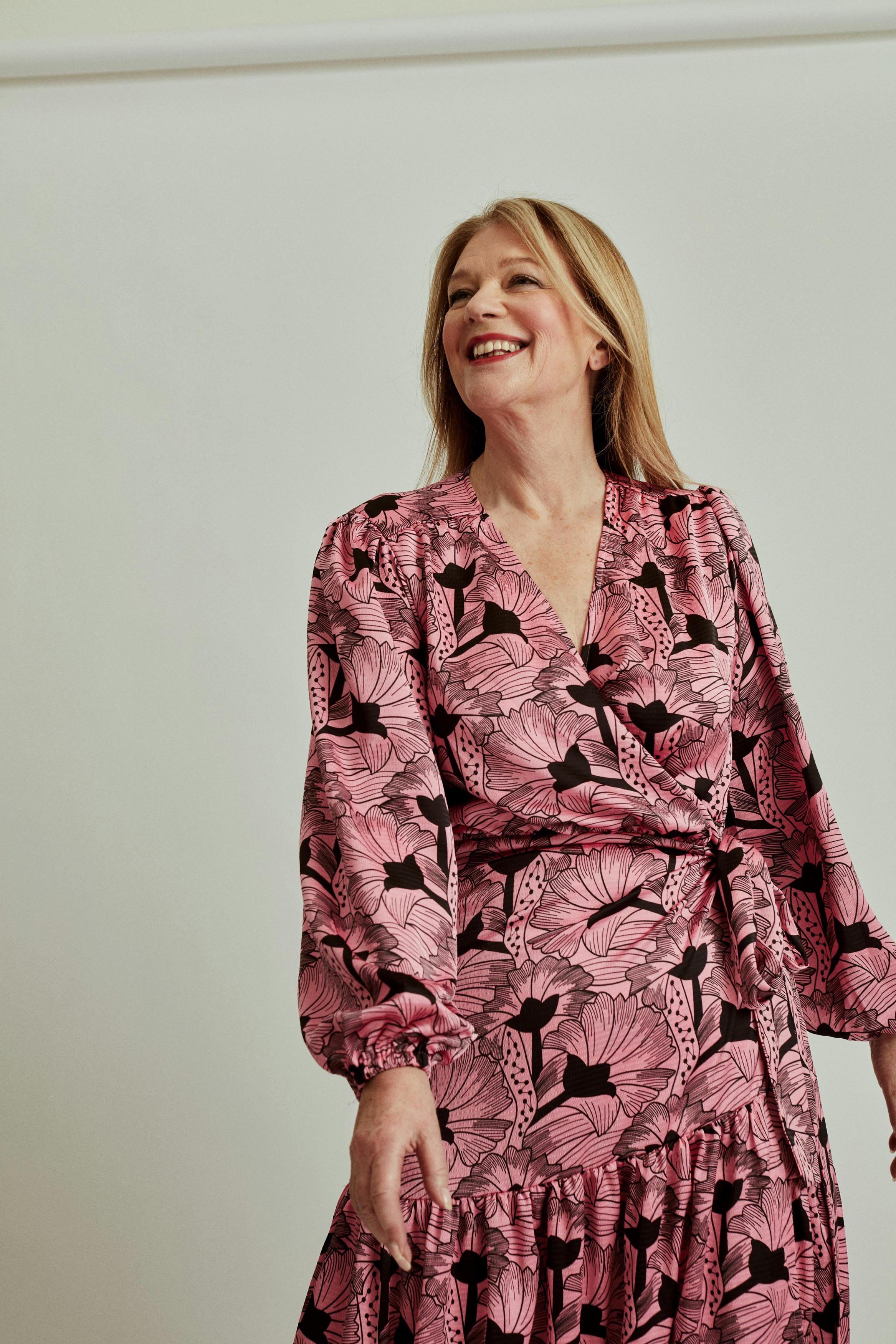 woman smiling with a carefree pose