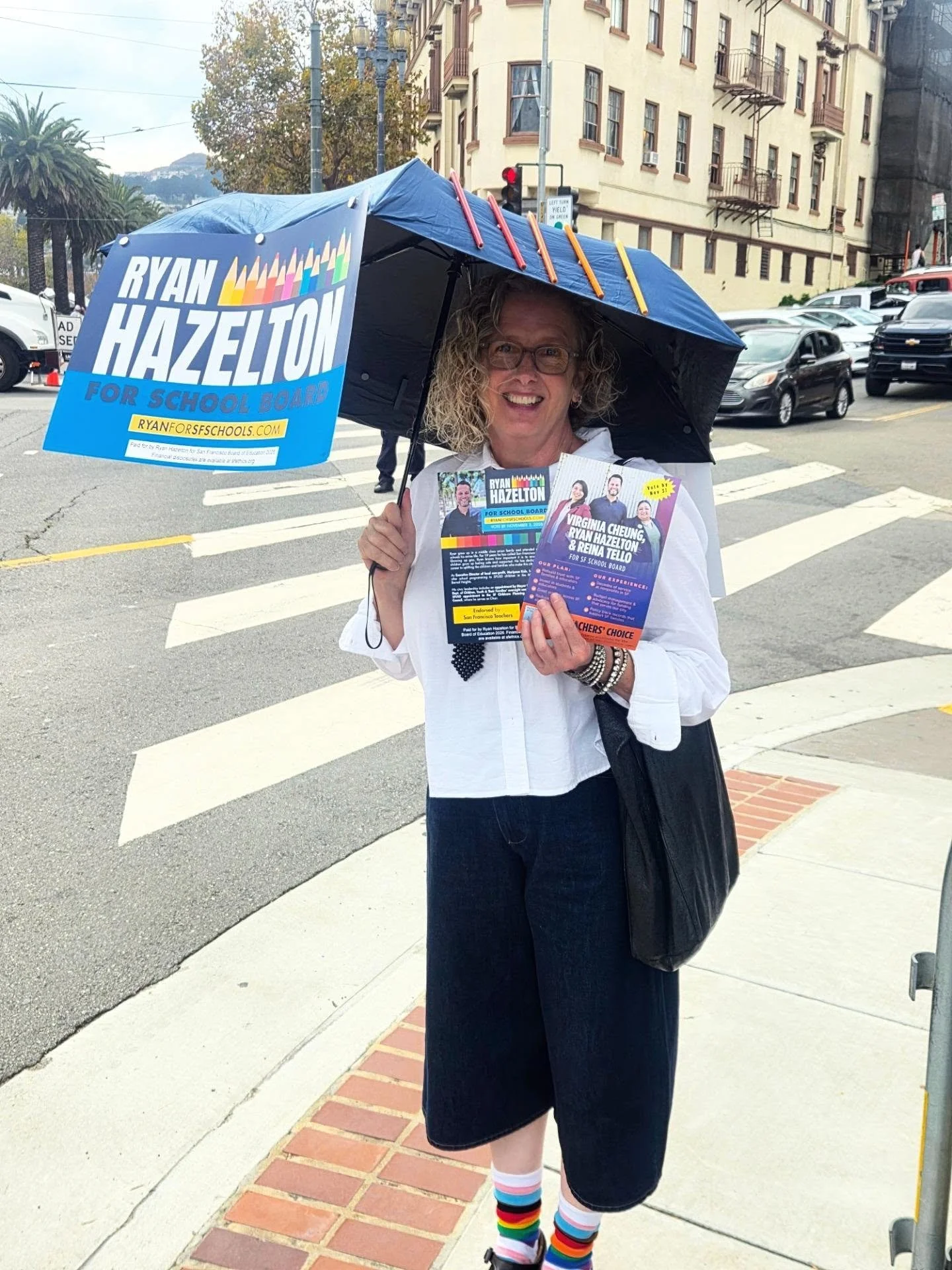 Our campaign volunteer, Susan, took things to the next level of awesomeness - a custom made umbrella with signs and colored pencils attached - and provides shades on a hot SF day. And check out those rainbow socks to stay on theme. THANK YOU SUSAN! H