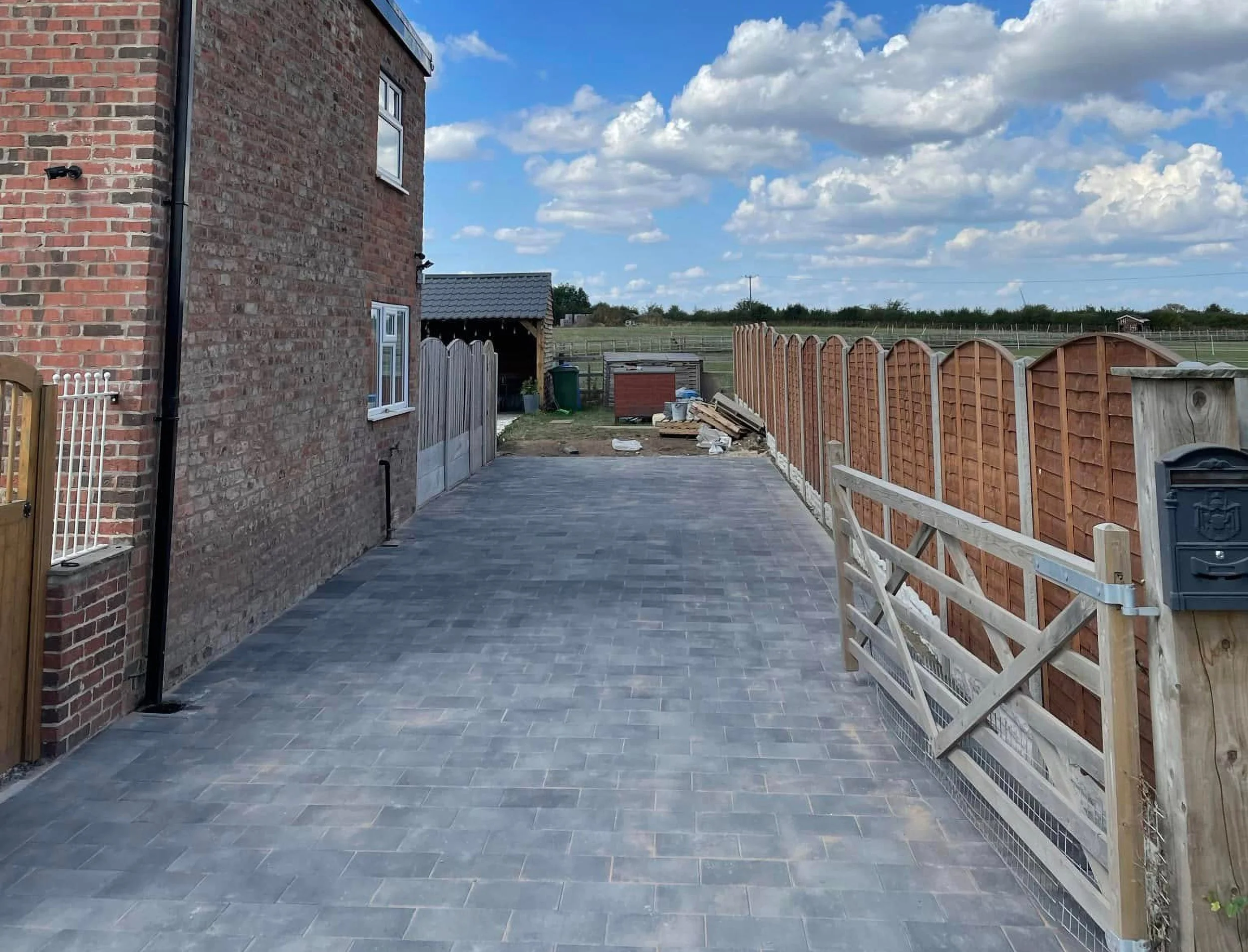 Completion of a block stone drivewy for a residential property.