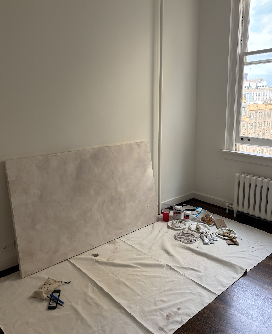 Canvas freshly covered in molding paste and acrylic paint, 2026
