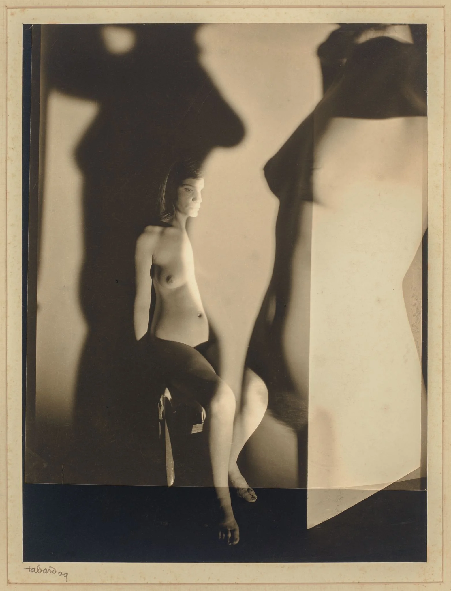 Maurice Tabard (French, 1897– 1984), Montage [Nude] (Montage [Nu]), Gelatin silver print, mounted on board with overmat, 9 × 7 inches Inscriptions
Signed and dated in pencil on
recto of mount;
Provenance:
The Collection of Robert Shapazian, Christie’