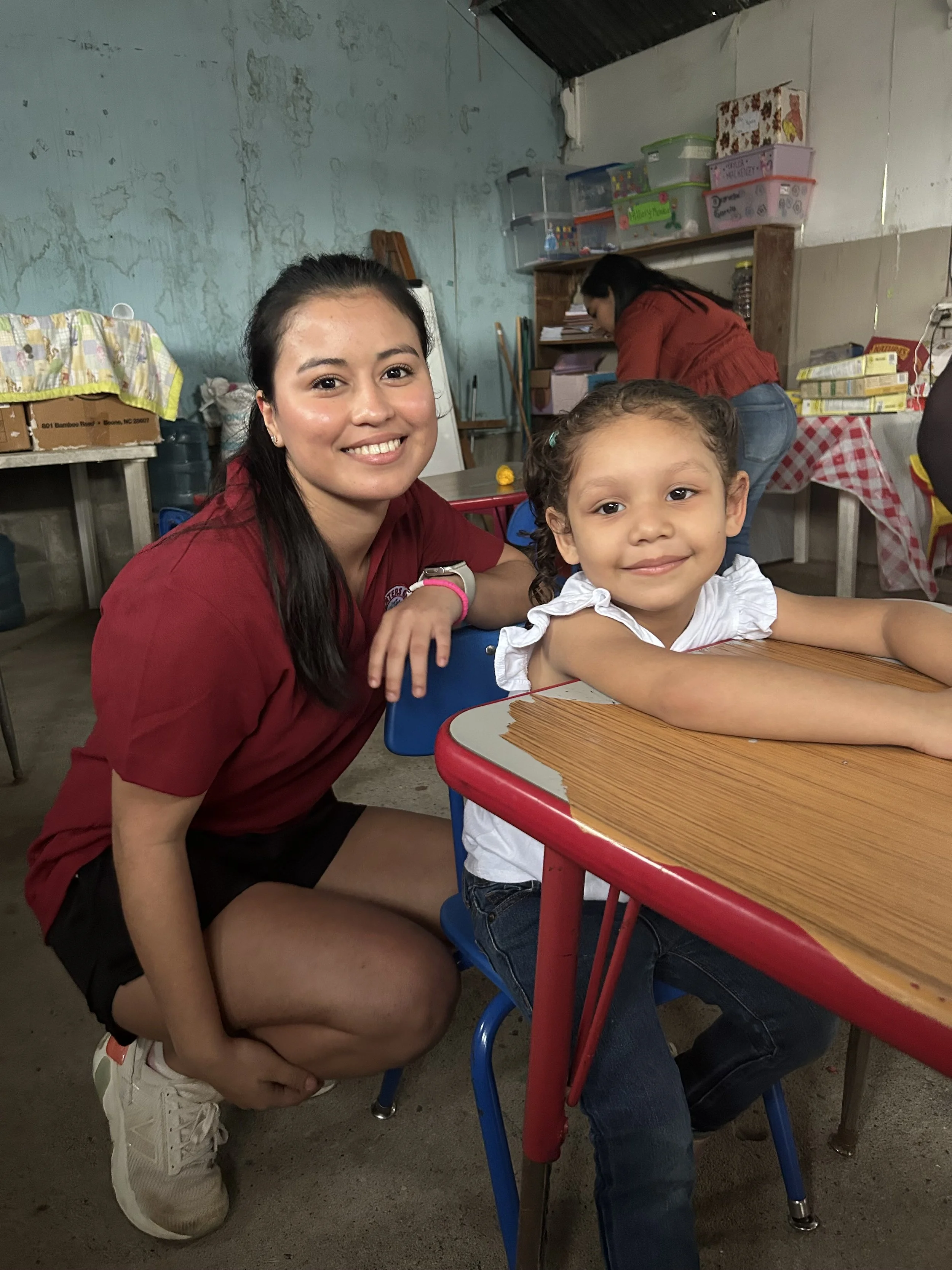 Ereminia and one of our pre-school children.
