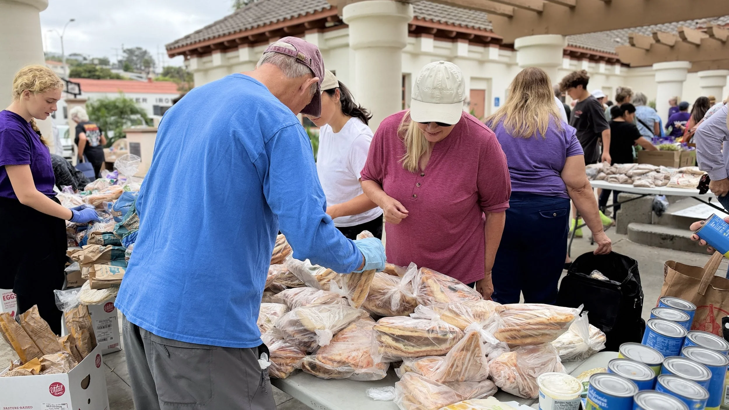 Sharing pizza at the farmers market