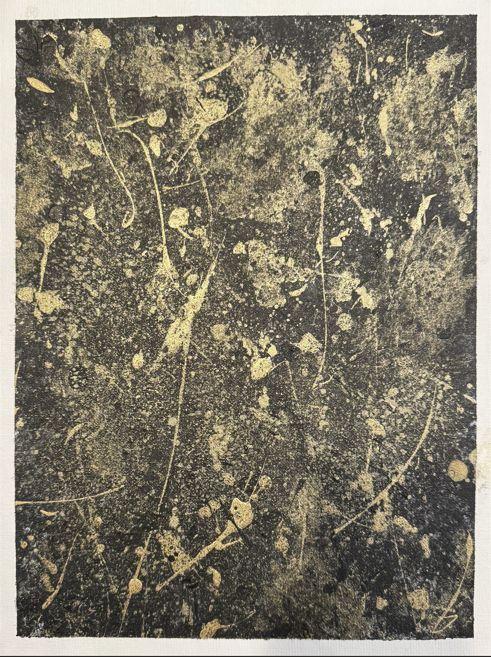 Abstract black and yellow textured pattern with irregular splatters and thin lines.