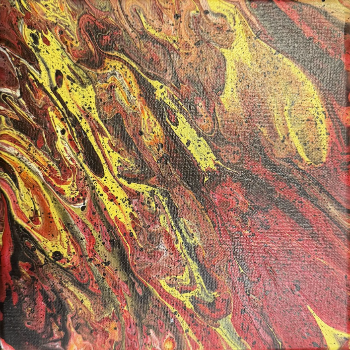 Abstract acrylic pour painting with swirls and splashes of yellow, red, black, and hints of white.