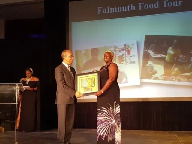  Janet Crick given Most Authentic Jamaican Attraction award in 2017 by Dr. Horace Chang for the Falmouth Food Tour 