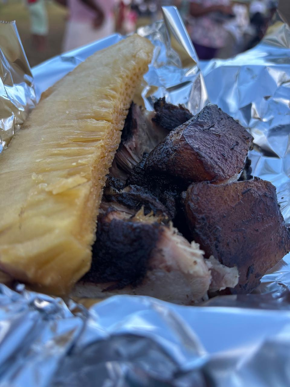 breadfruit and pork in tin foil