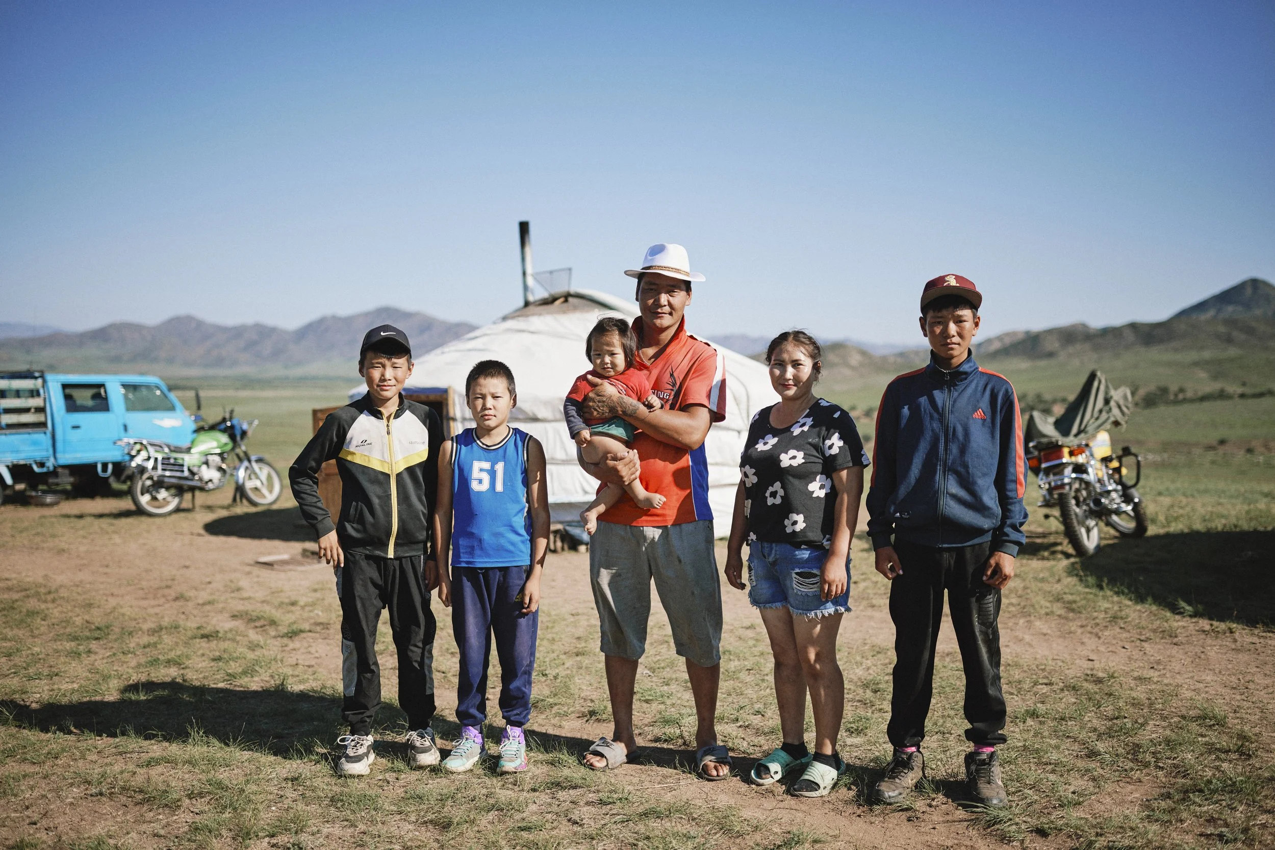 Mongolian family says goodbye after tea.