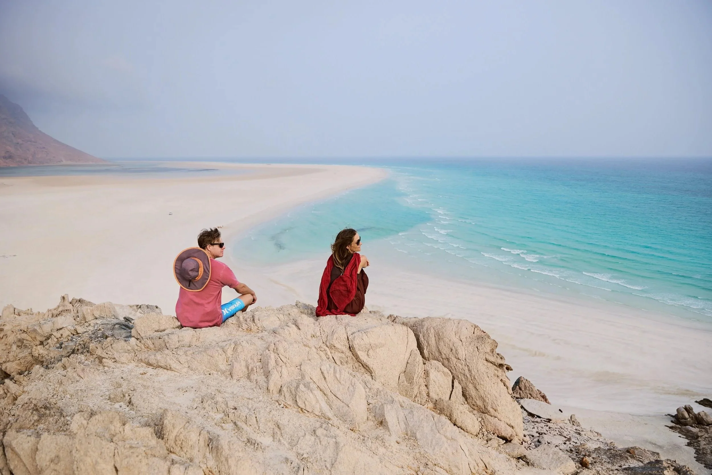 A couple stares into the bay of Qulansiya, Socotra. The ultimate adventure and one of a kind experience on Socotra.